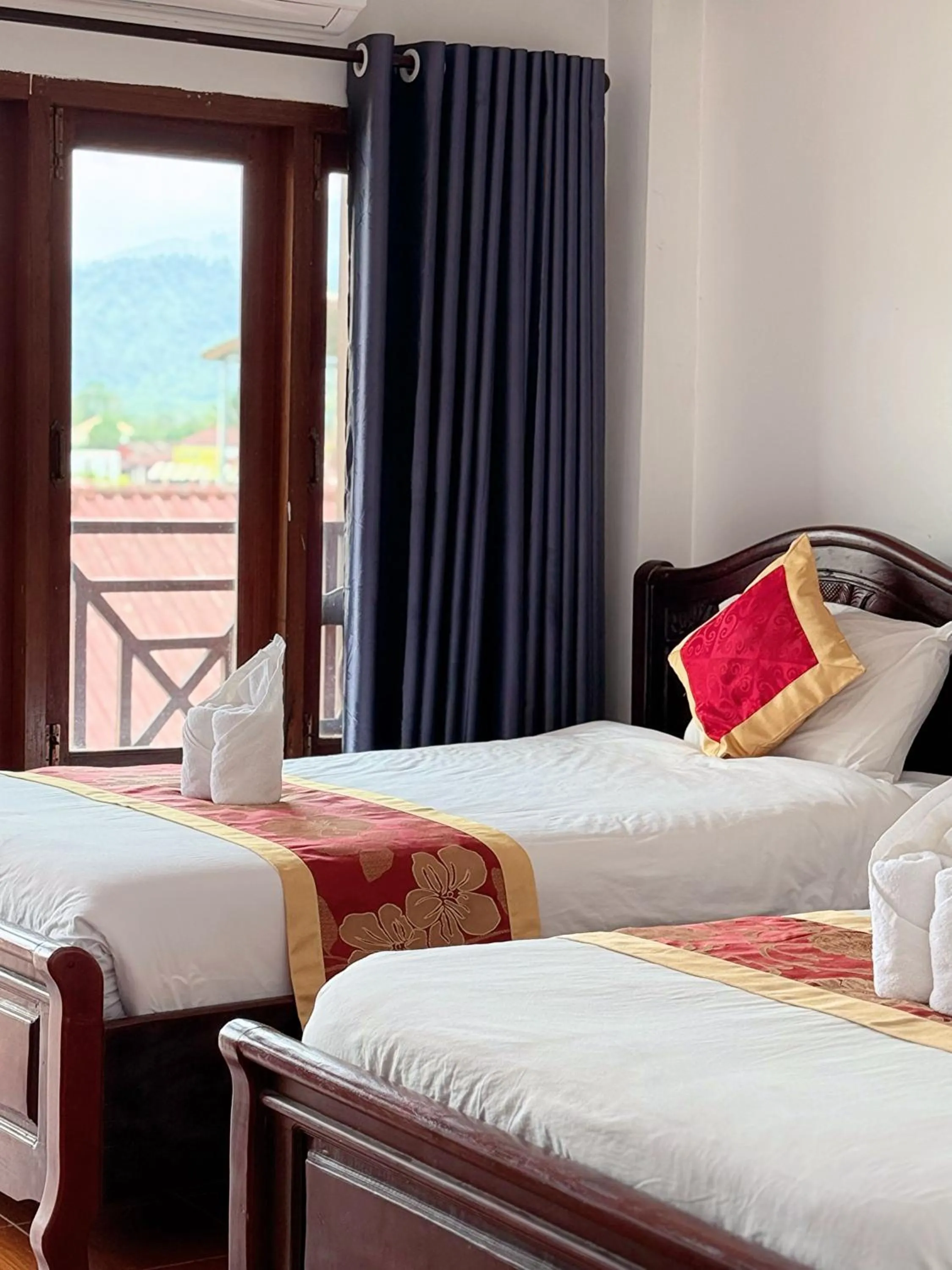 Bed in Vangvieng Sisavang Mountain View Hotel