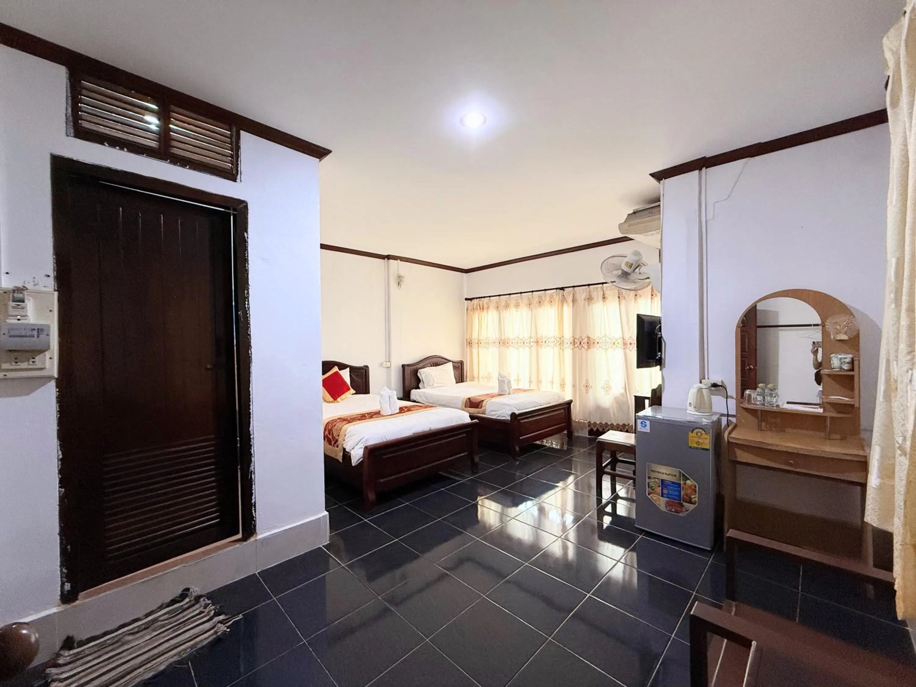 Bed in Vangvieng Sisavang Mountain View Hotel