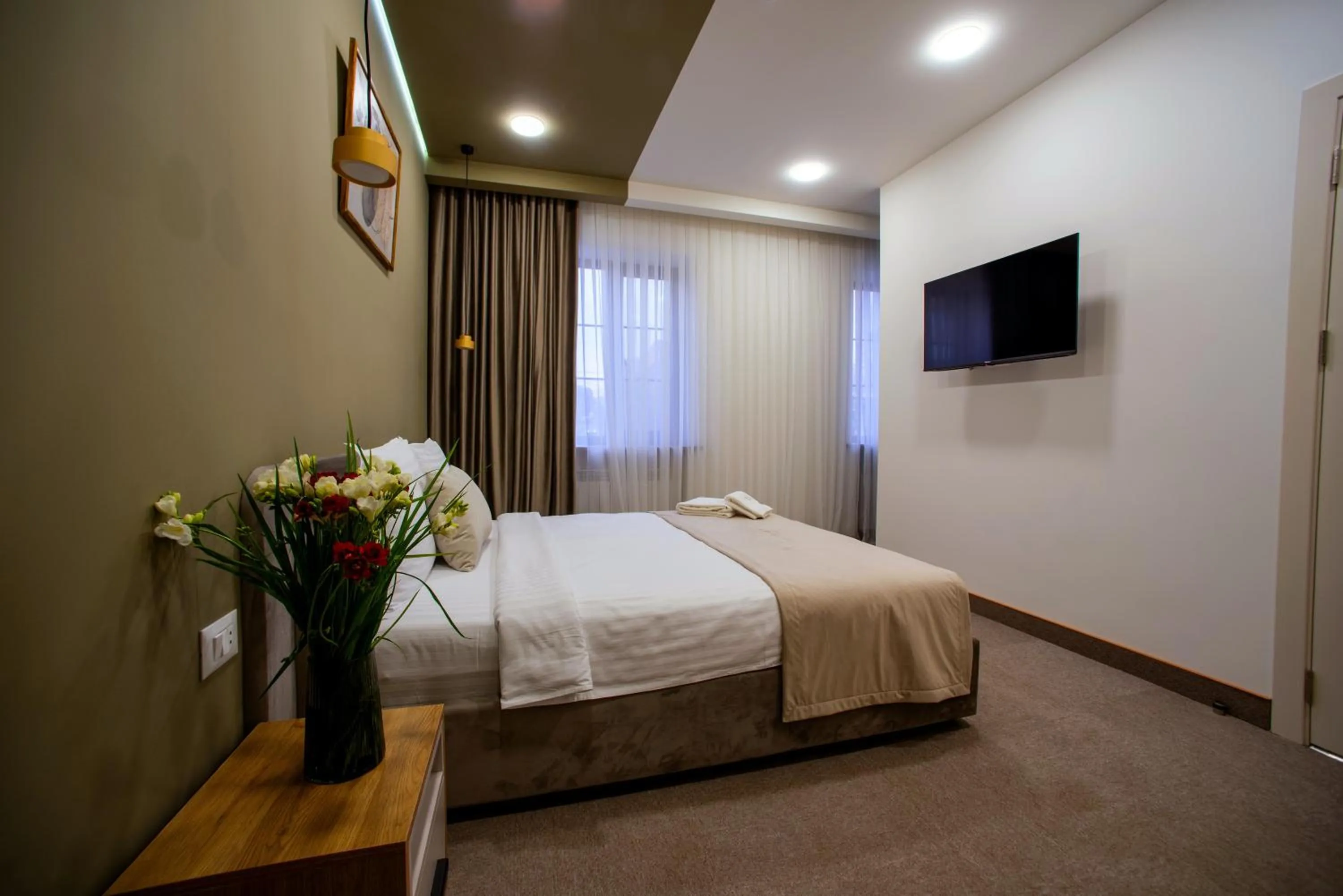 Communal lounge/ TV room, Bed in The House Hotel Yerevan