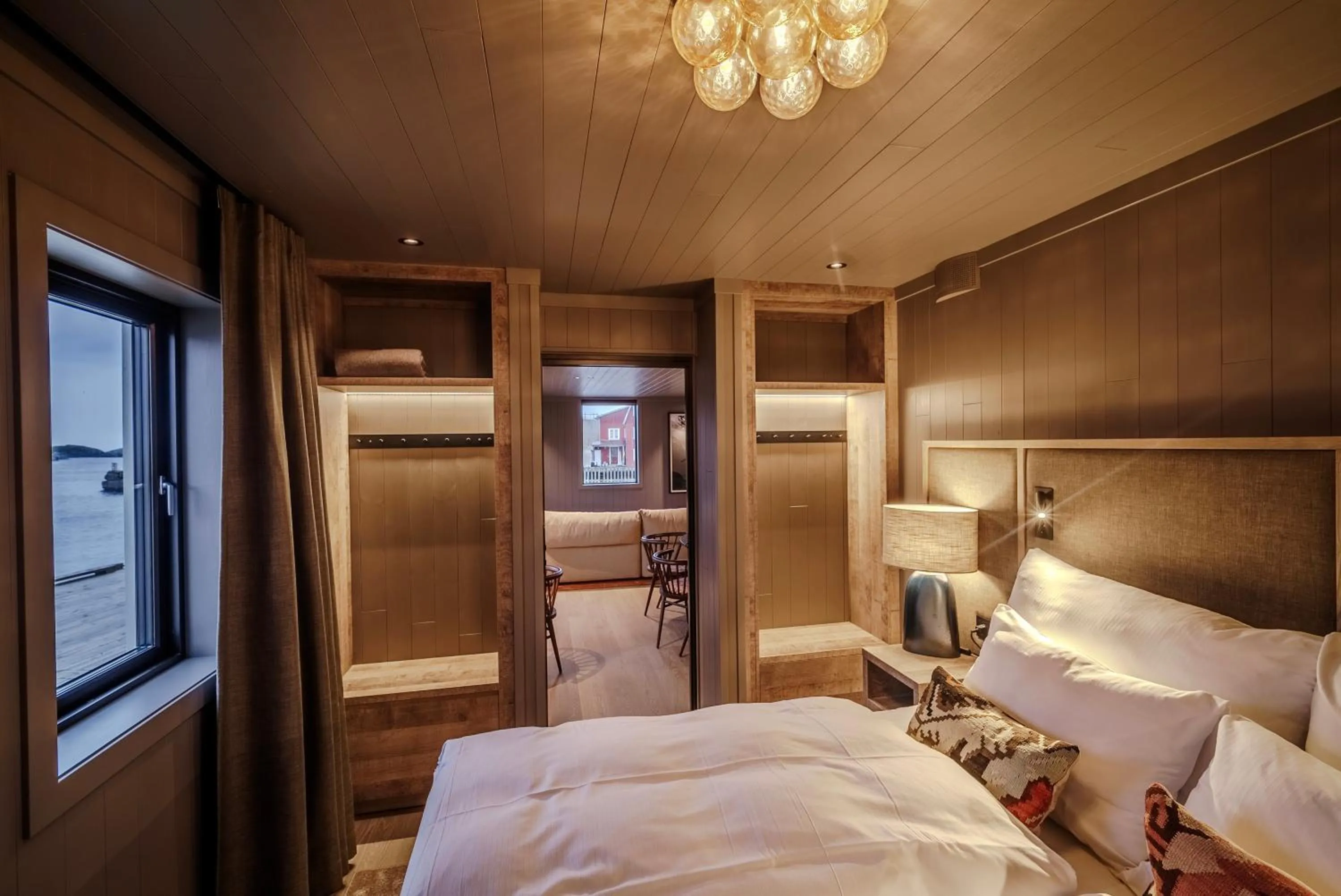Bedroom, Bed in Henningsvær Bryggehotell - by Classic Norway Hotels