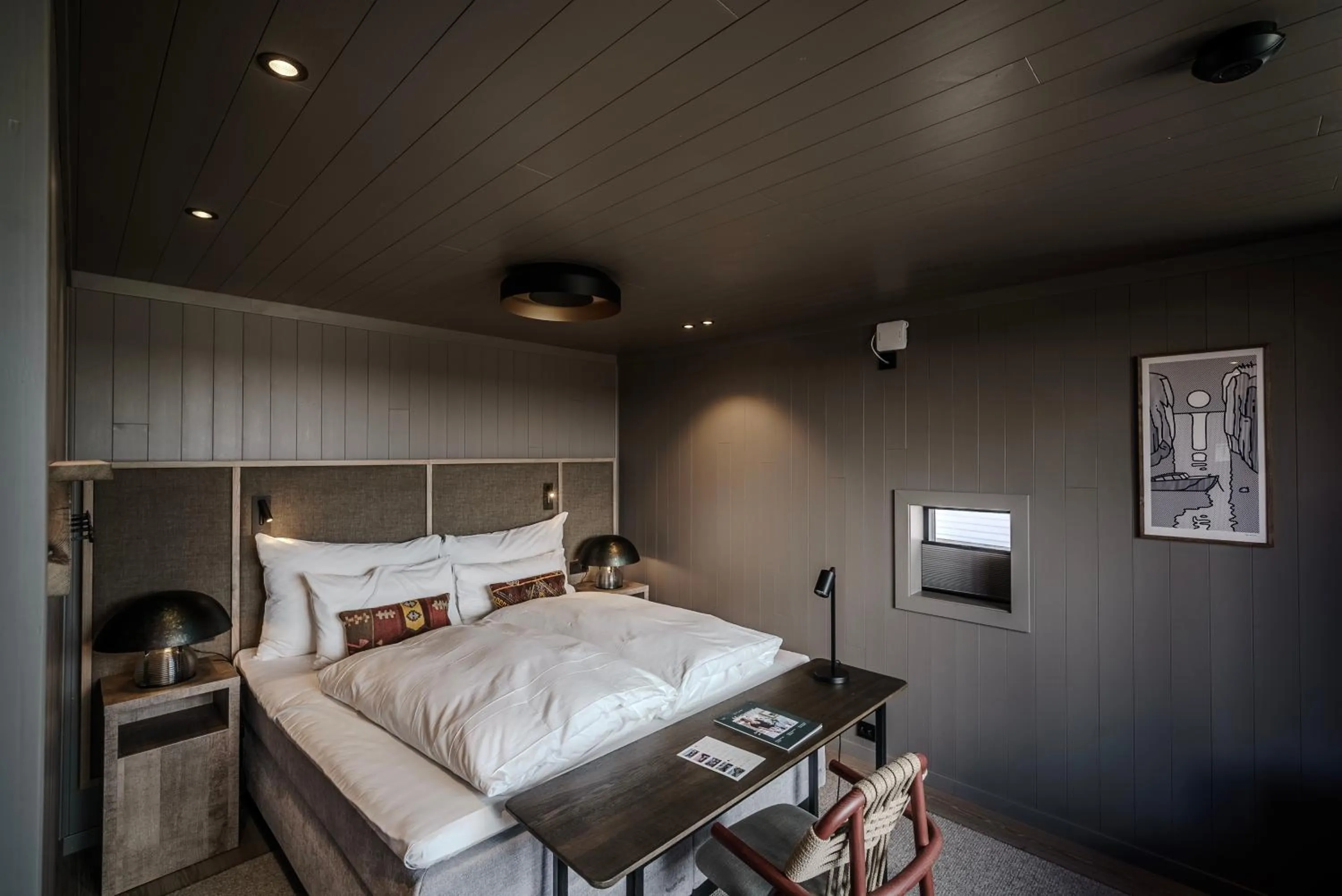 Bed in Henningsvær Bryggehotell - by Classic Norway Hotels