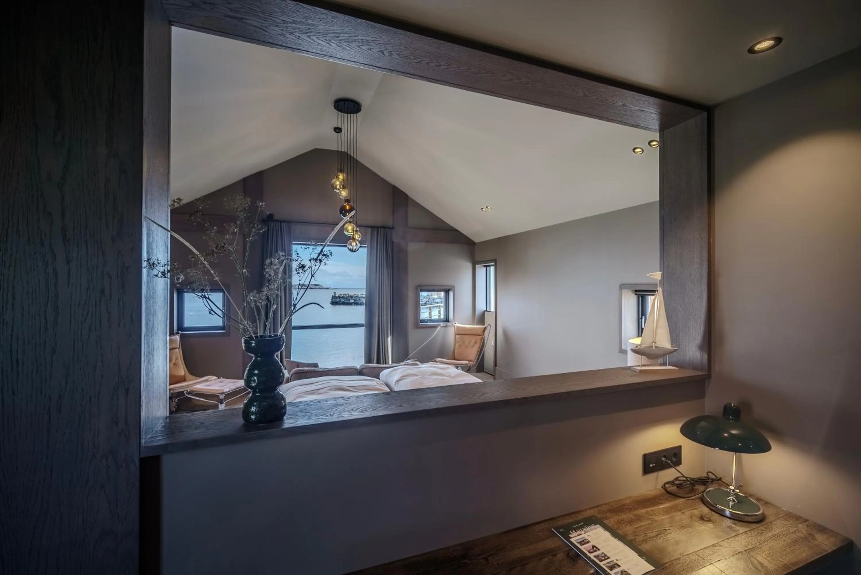 Photo of the whole room, Bed in Henningsvær Bryggehotell - by Classic Norway Hotels