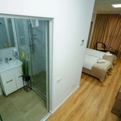 Bed in Sir Fundeni Hotel