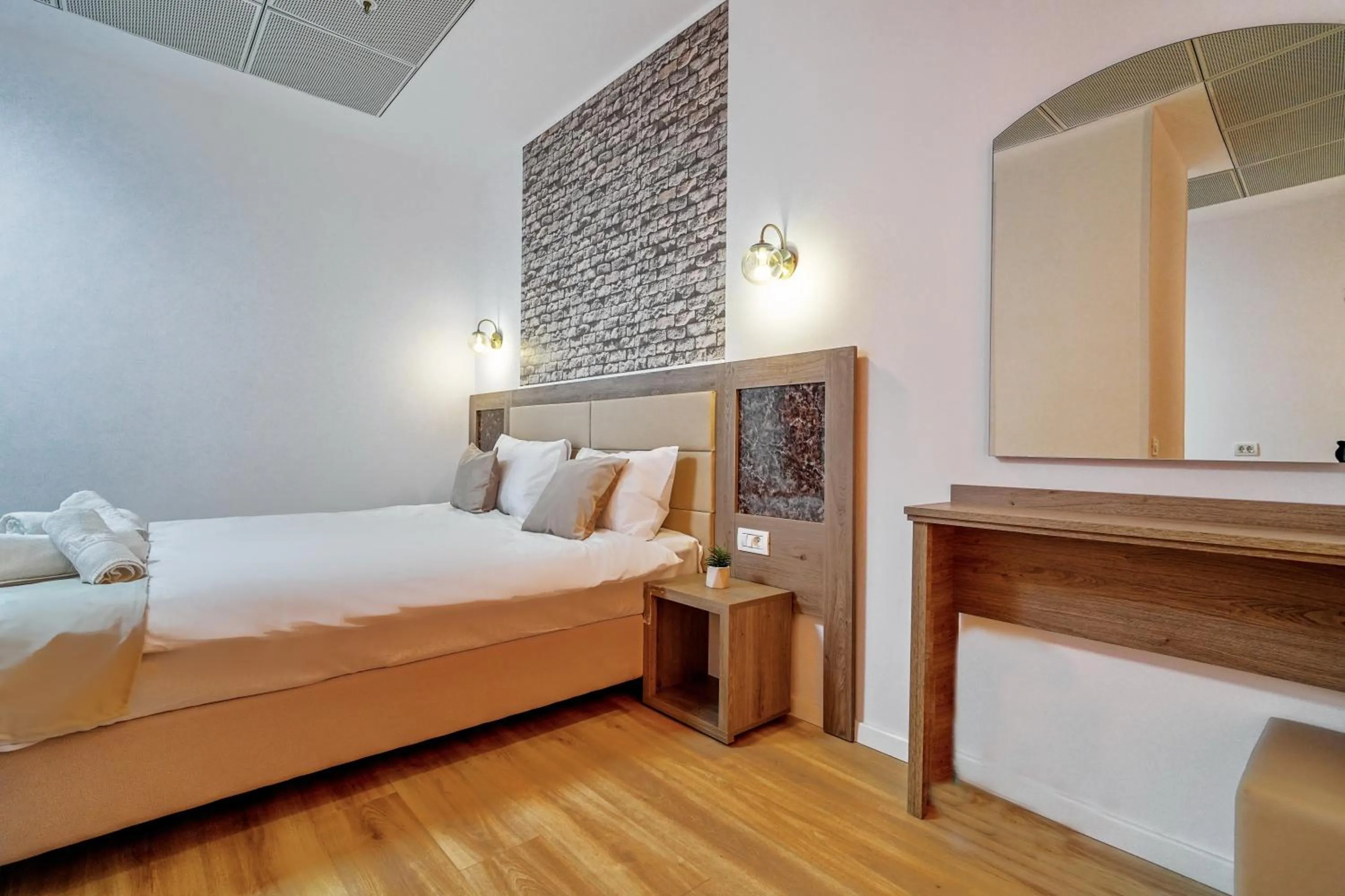 Bed in Sir Fundeni Hotel