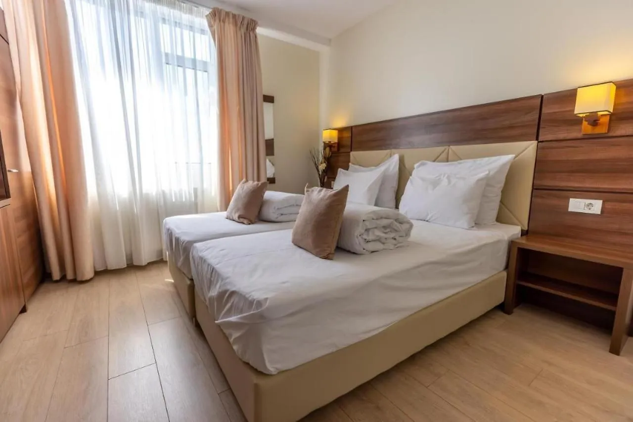 Bed in Sir Fundeni Hotel