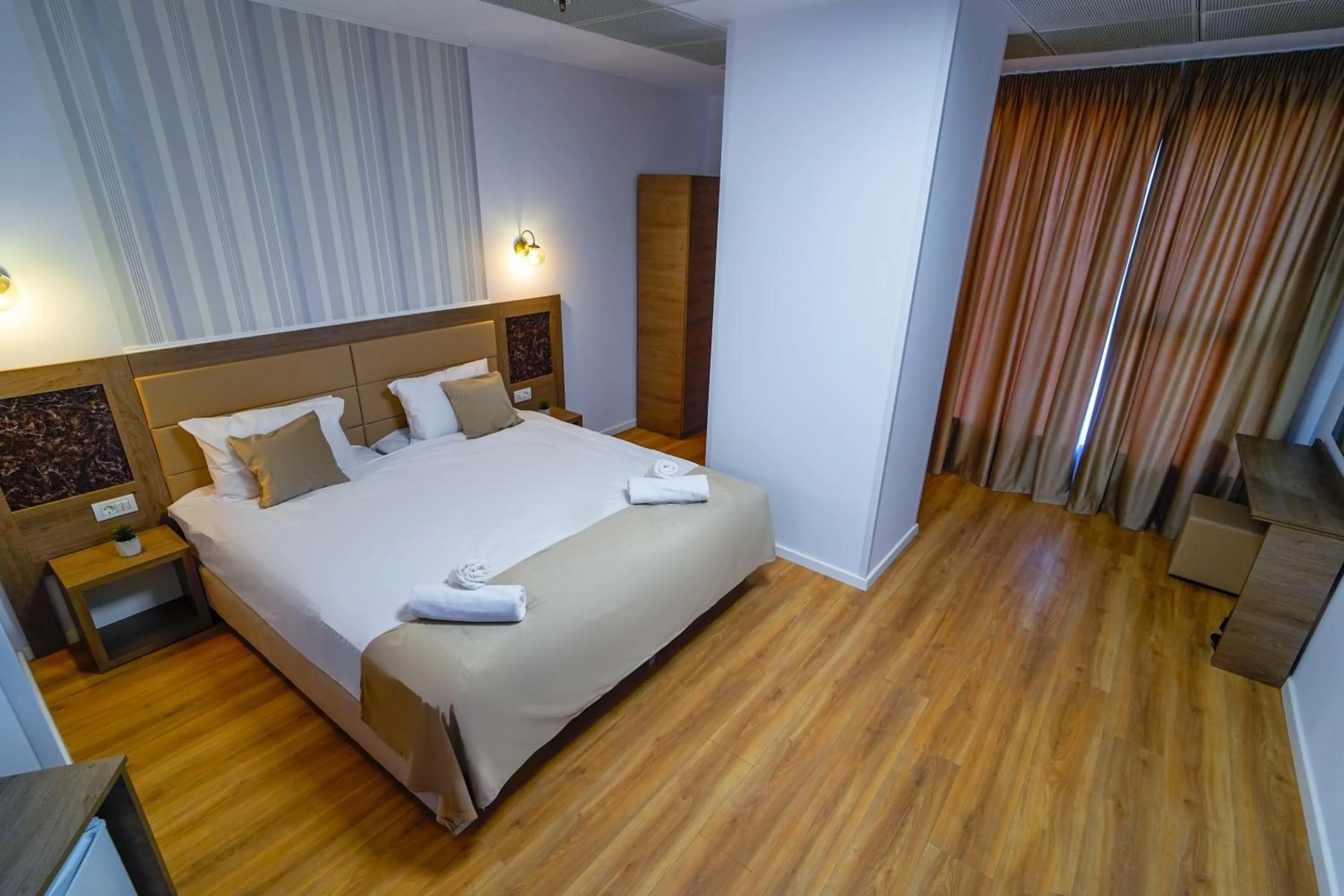 Bed in Sir Fundeni Hotel