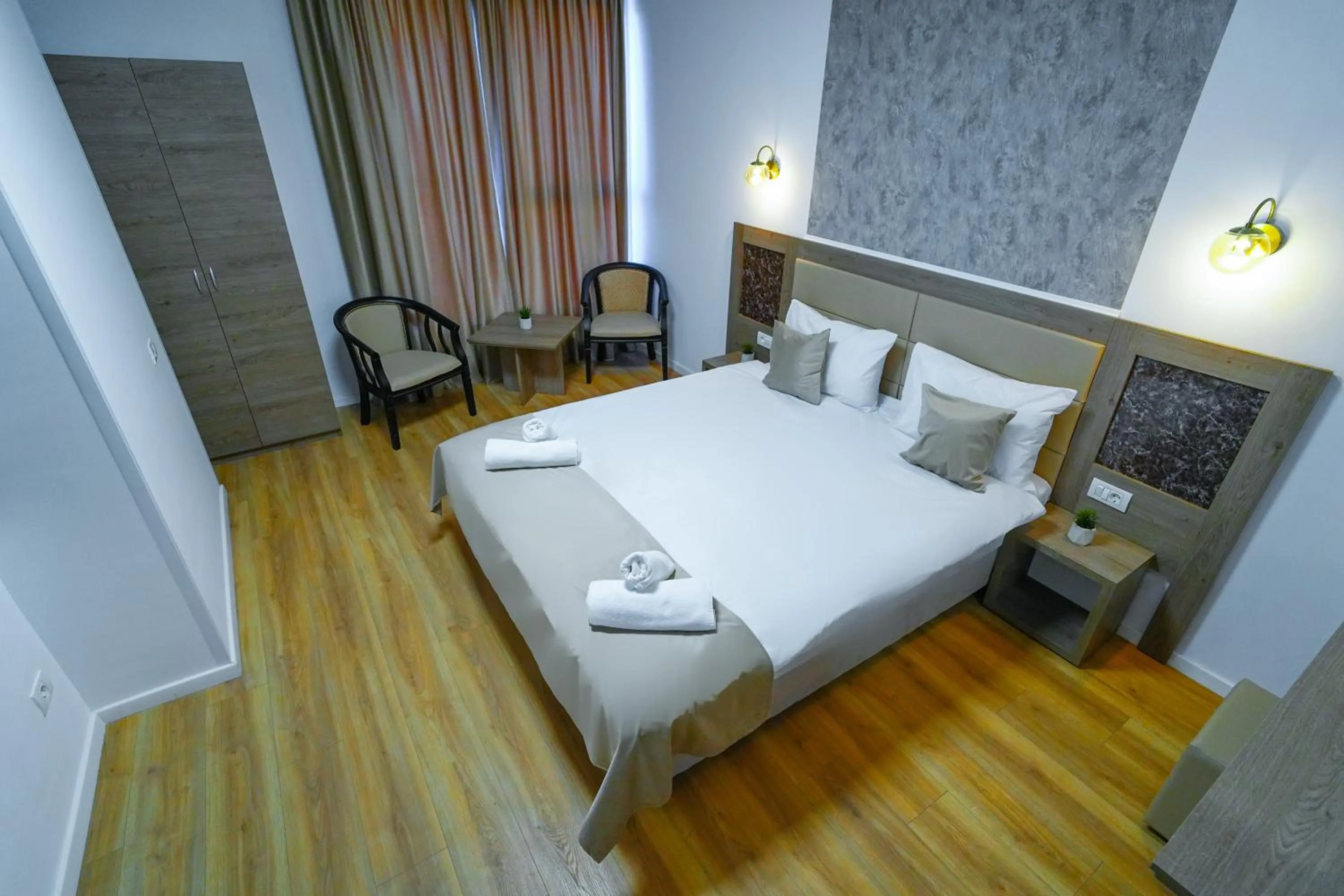 Bed in Sir Fundeni Hotel