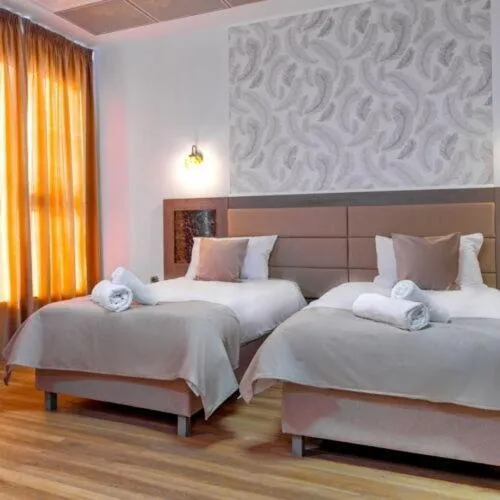 Bed in Sir Fundeni Hotel