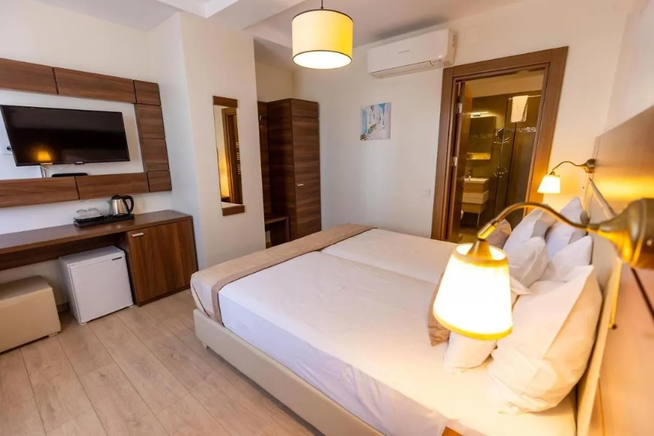 Bed in Sir Fundeni Hotel