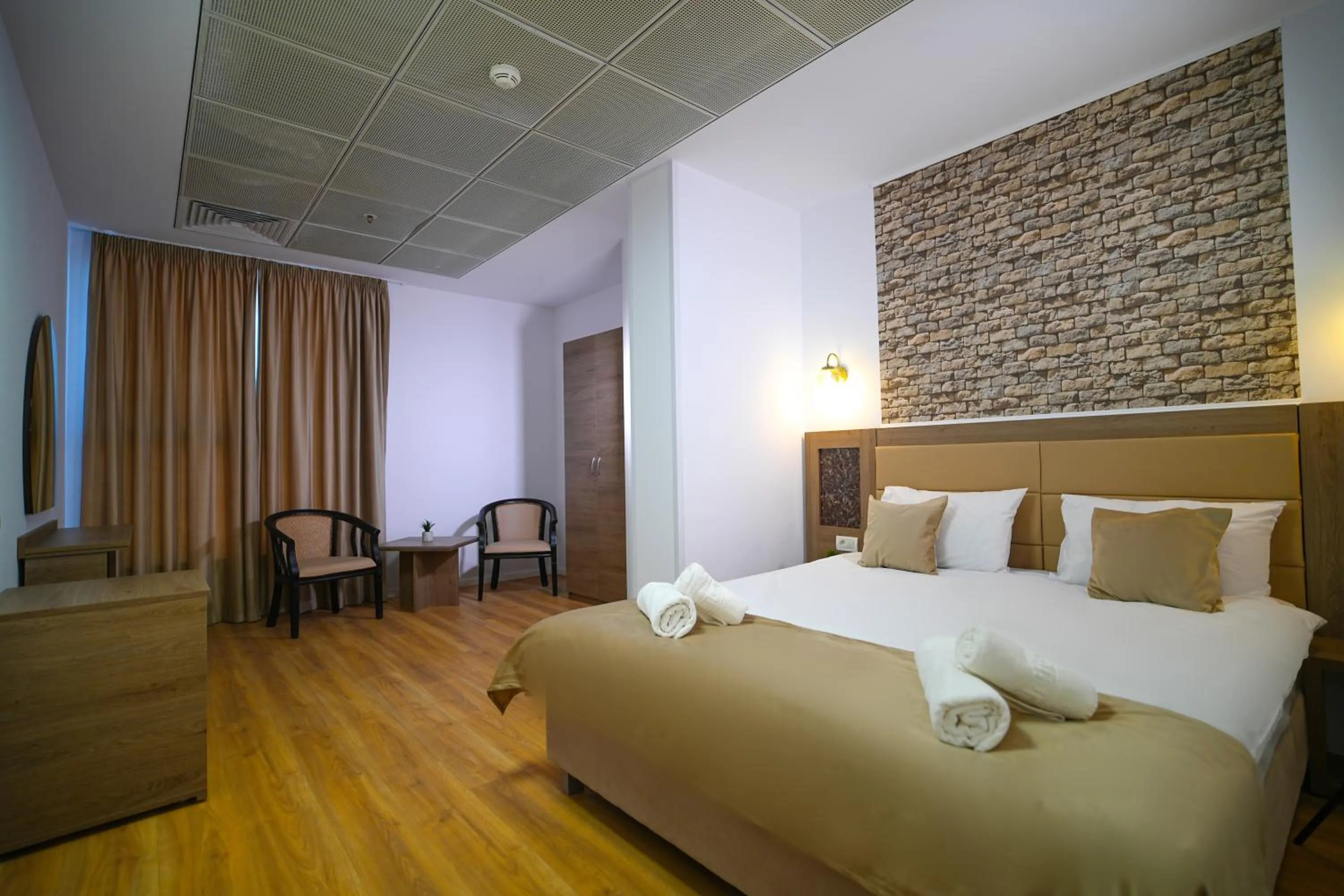 Bed in Sir Fundeni Hotel