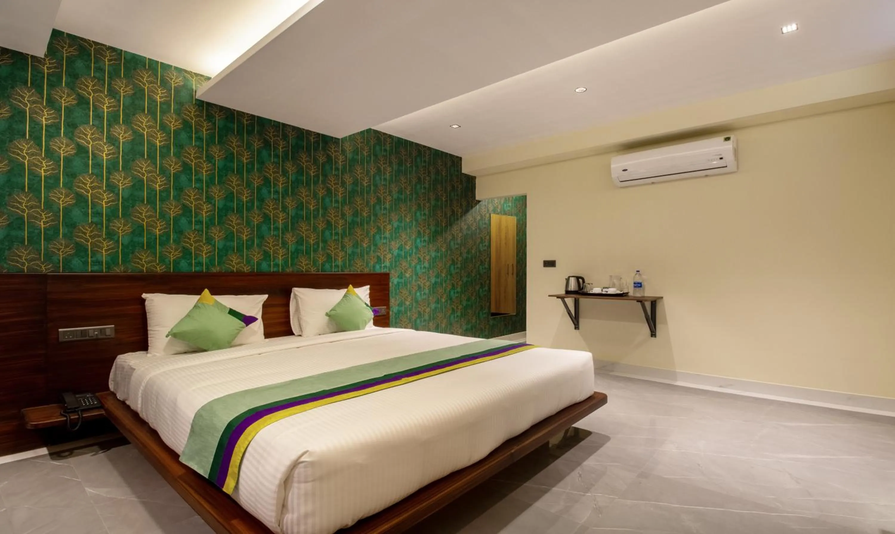 Bedroom in Treebo Jaguar Comforts, 3 Kms From Mahatma Gandhi Park