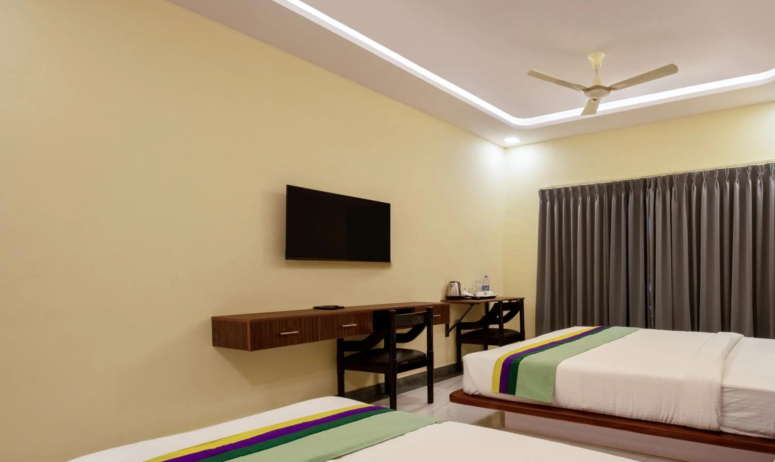 Bedroom in Treebo Jaguar Comforts, 3 Kms From Mahatma Gandhi Park