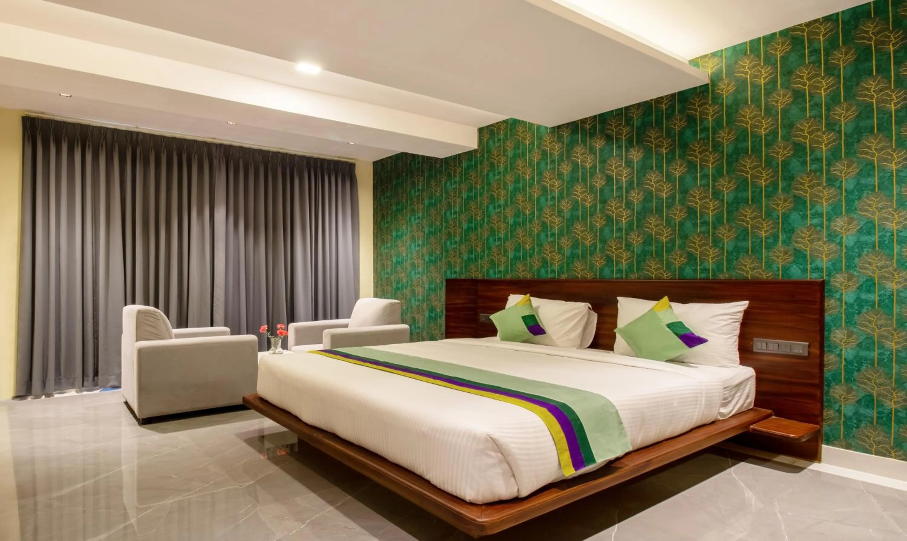 Bedroom in Treebo Jaguar Comforts, 3 Kms From Mahatma Gandhi Park