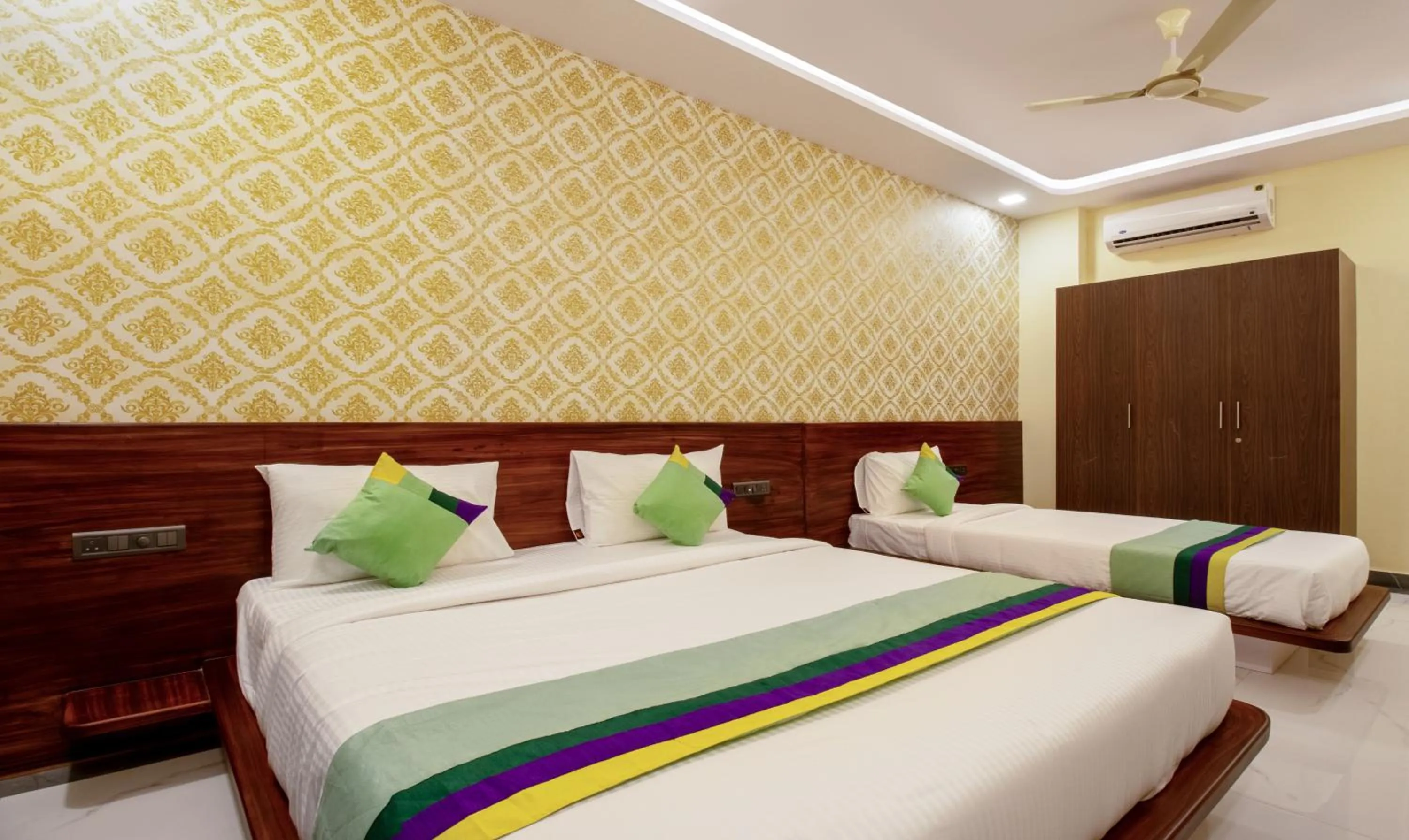 Bedroom in Treebo Jaguar Comforts, 3 Kms From Mahatma Gandhi Park