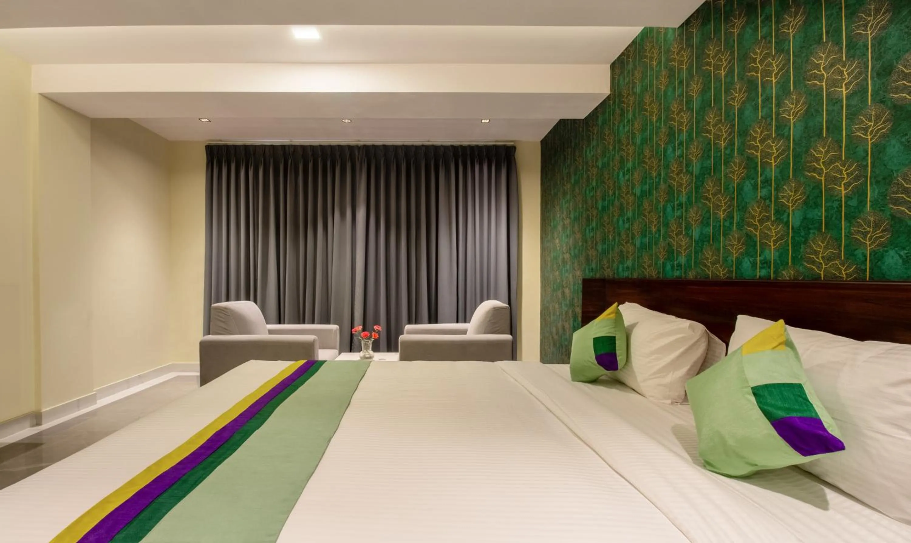 Bedroom in Treebo Jaguar Comforts, 3 Kms From Mahatma Gandhi Park