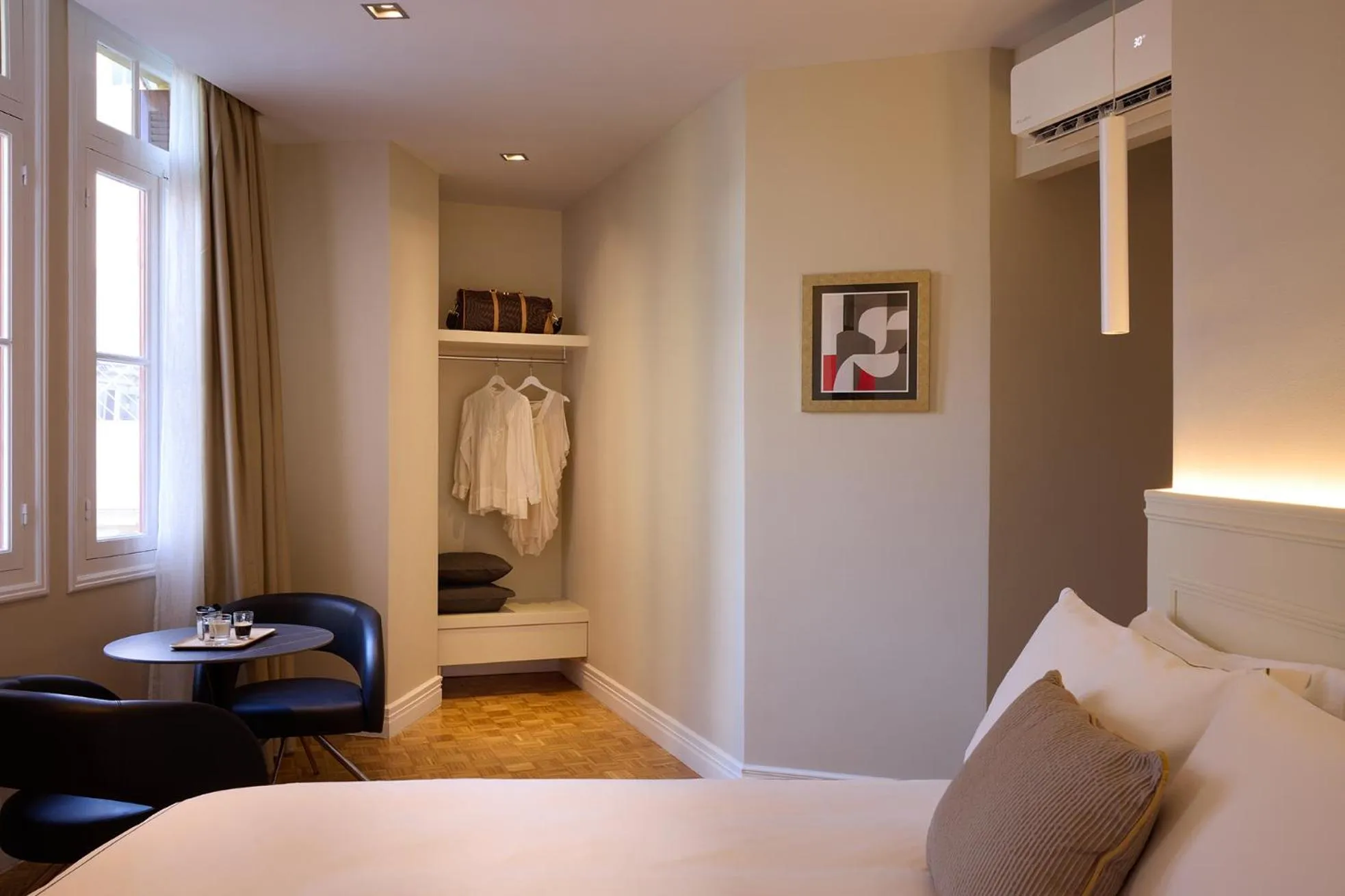 Bed in Vrachos Athens Suites