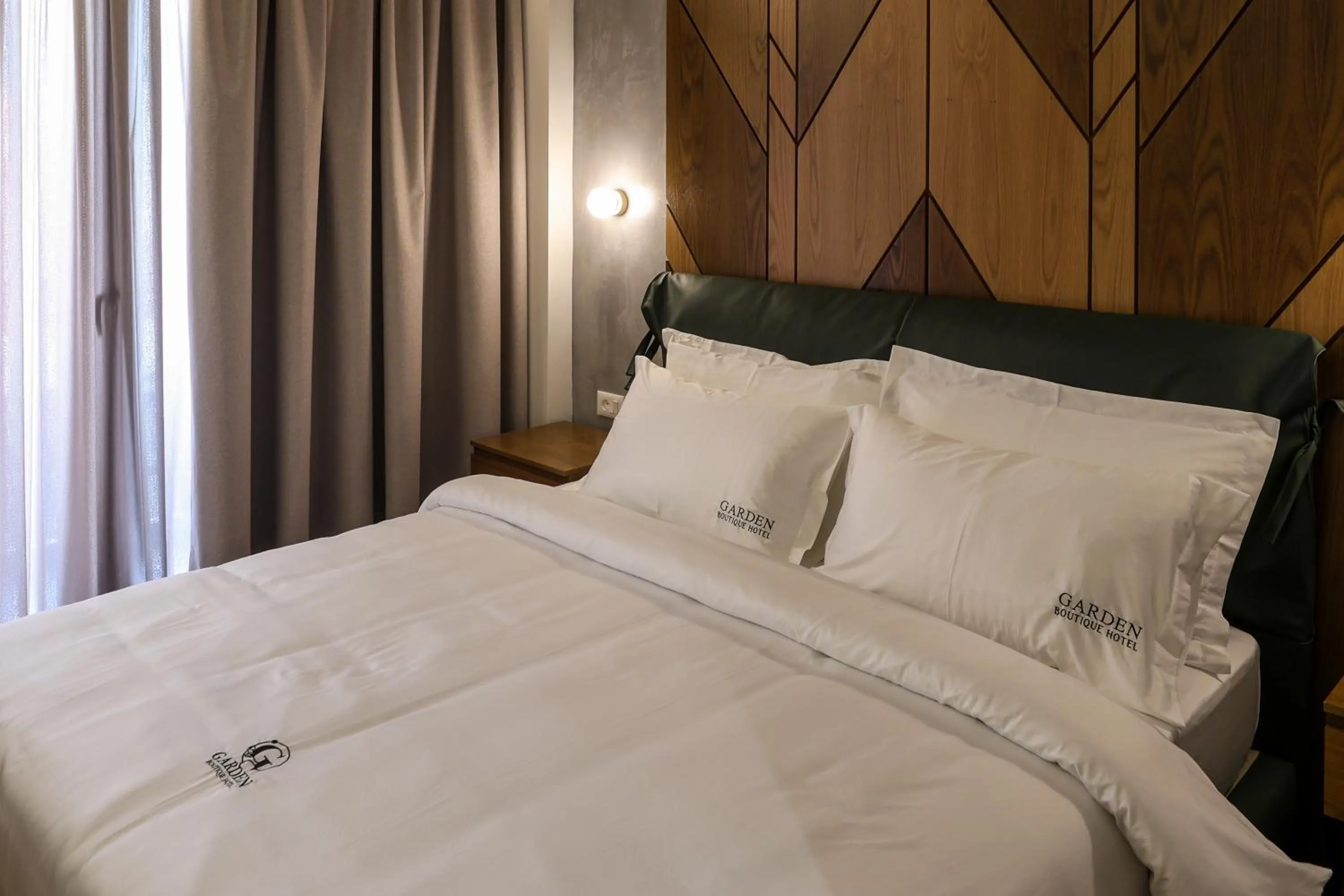 Bed in Garden Boutique Hotel