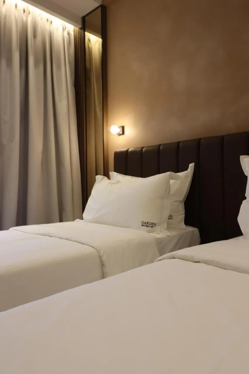 Bed in Garden Boutique Hotel