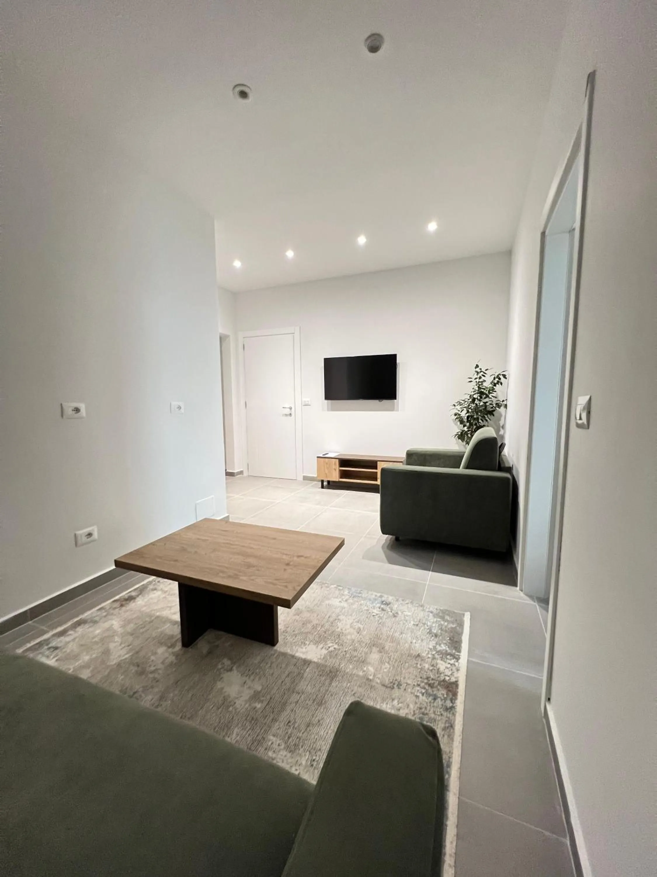 Communal lounge/ TV room in Garden Boutique Hotel