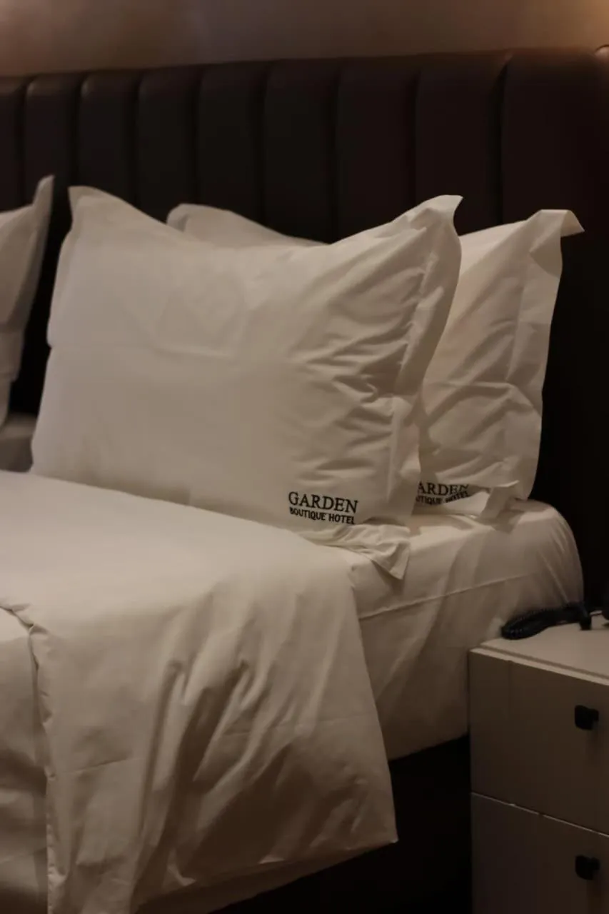 Bed in Garden Boutique Hotel