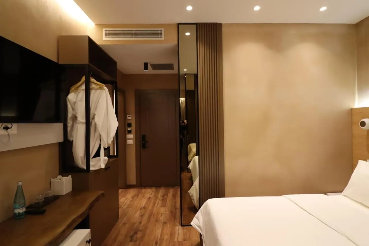 towels, Bed in Garden Boutique Hotel