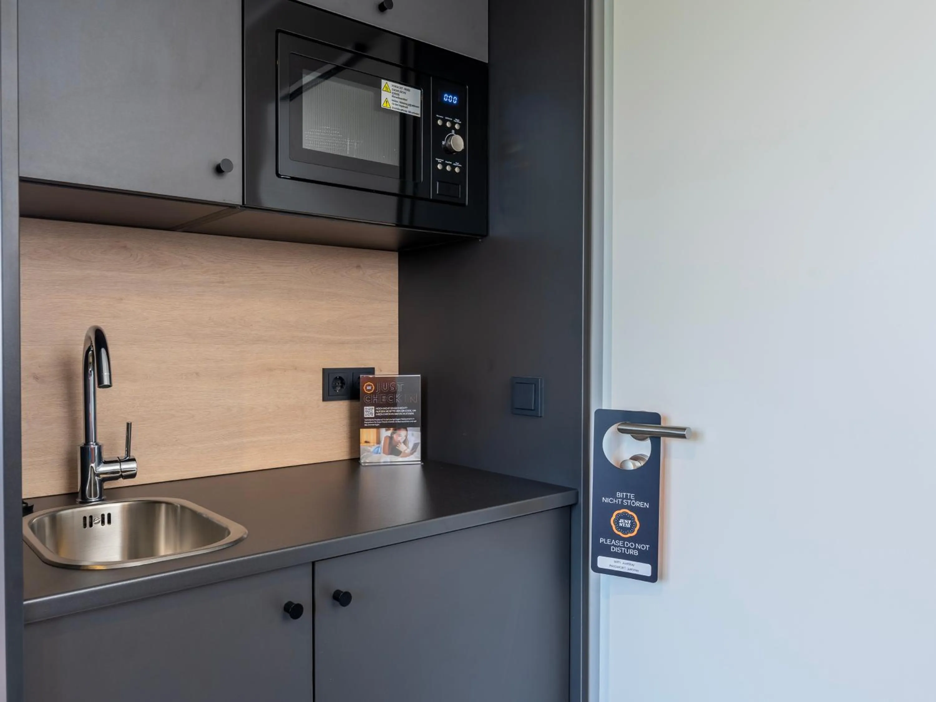 Kitchen or kitchenette in JustStay Essen Hotel & Apartments