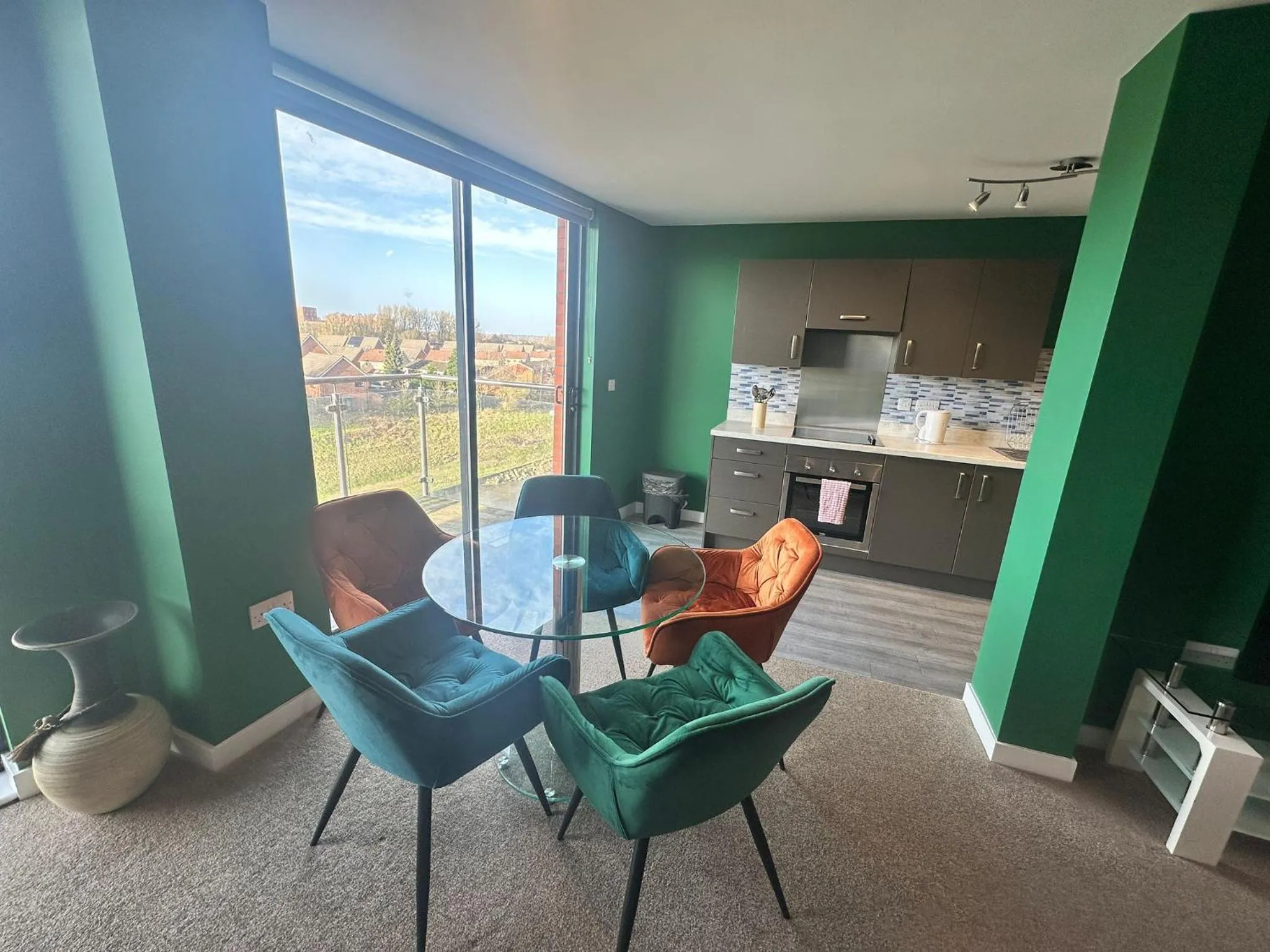 Seating area in Adelphi Wharf Apartments by Beehosting