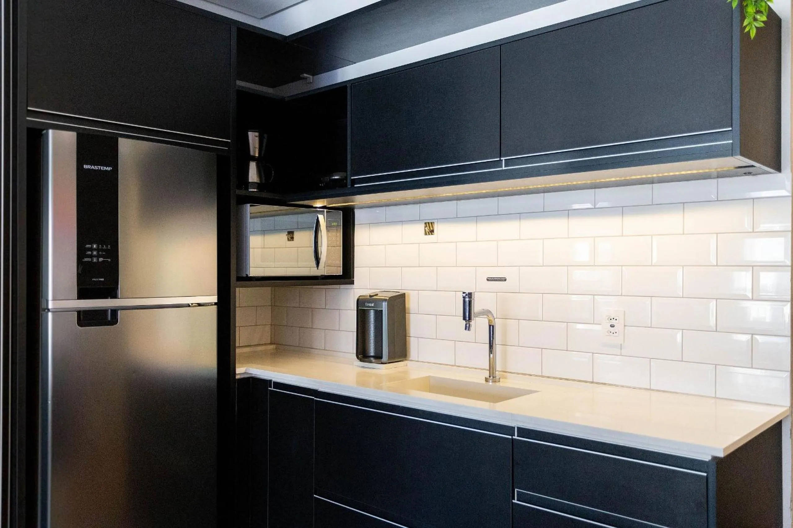 Kitchen or kitchenette in Condomínio Setin Downtown Genebra - Studios por temporada