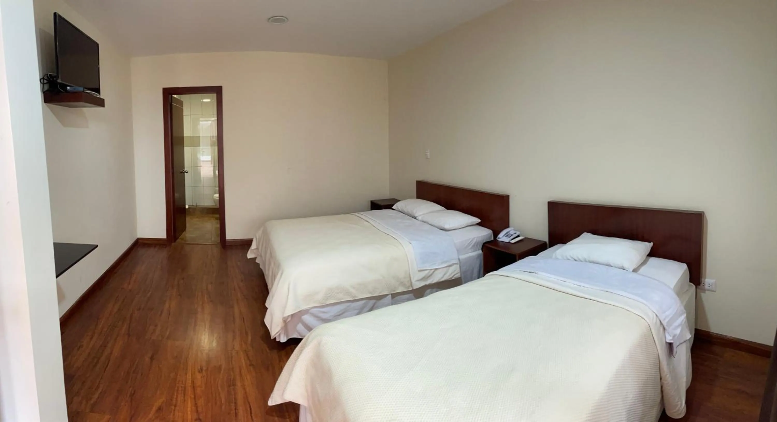 Photo of the whole room, Bed in Floré Hotel Boutique Cuenca