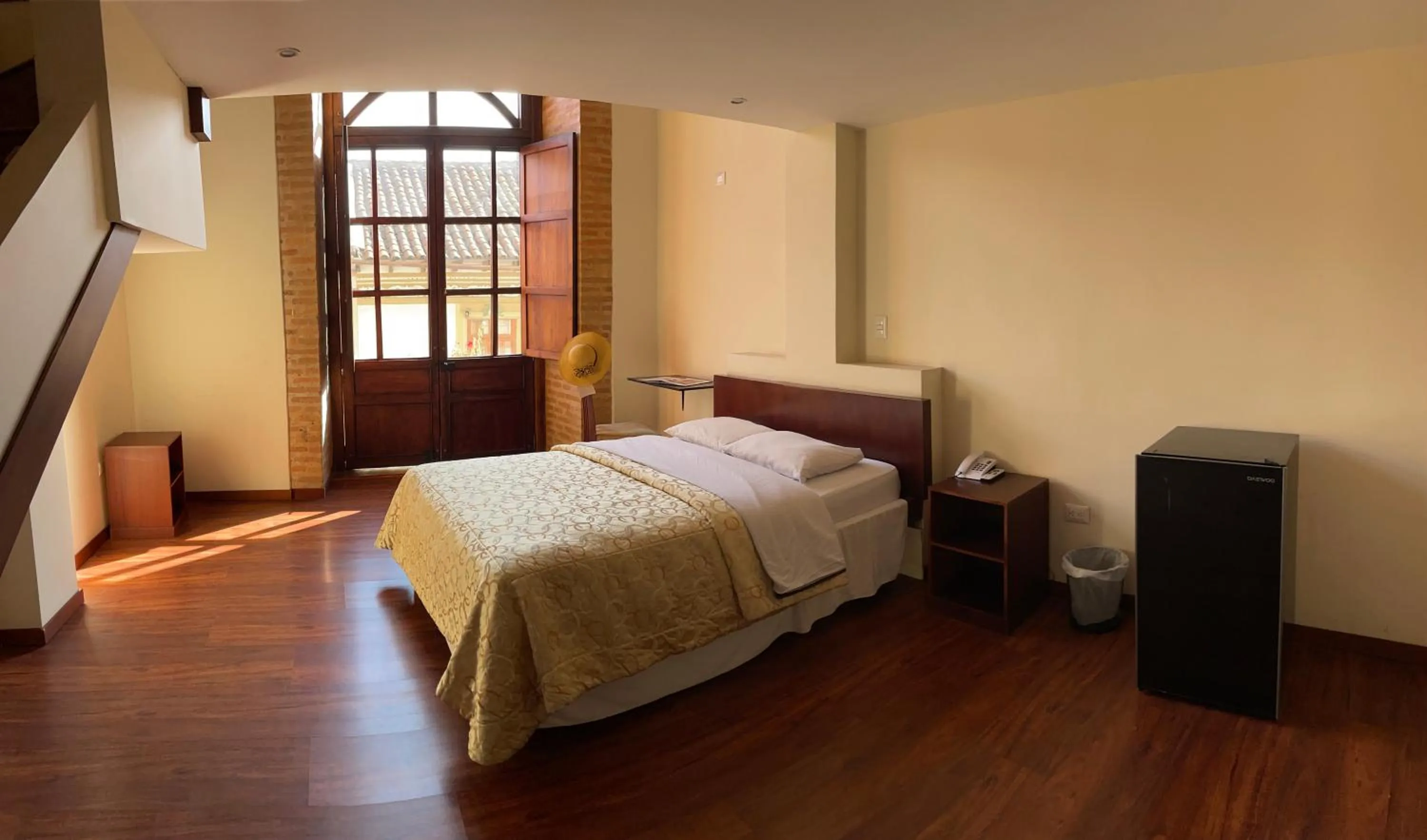 Photo of the whole room, Bed in Floré Hotel Boutique Cuenca