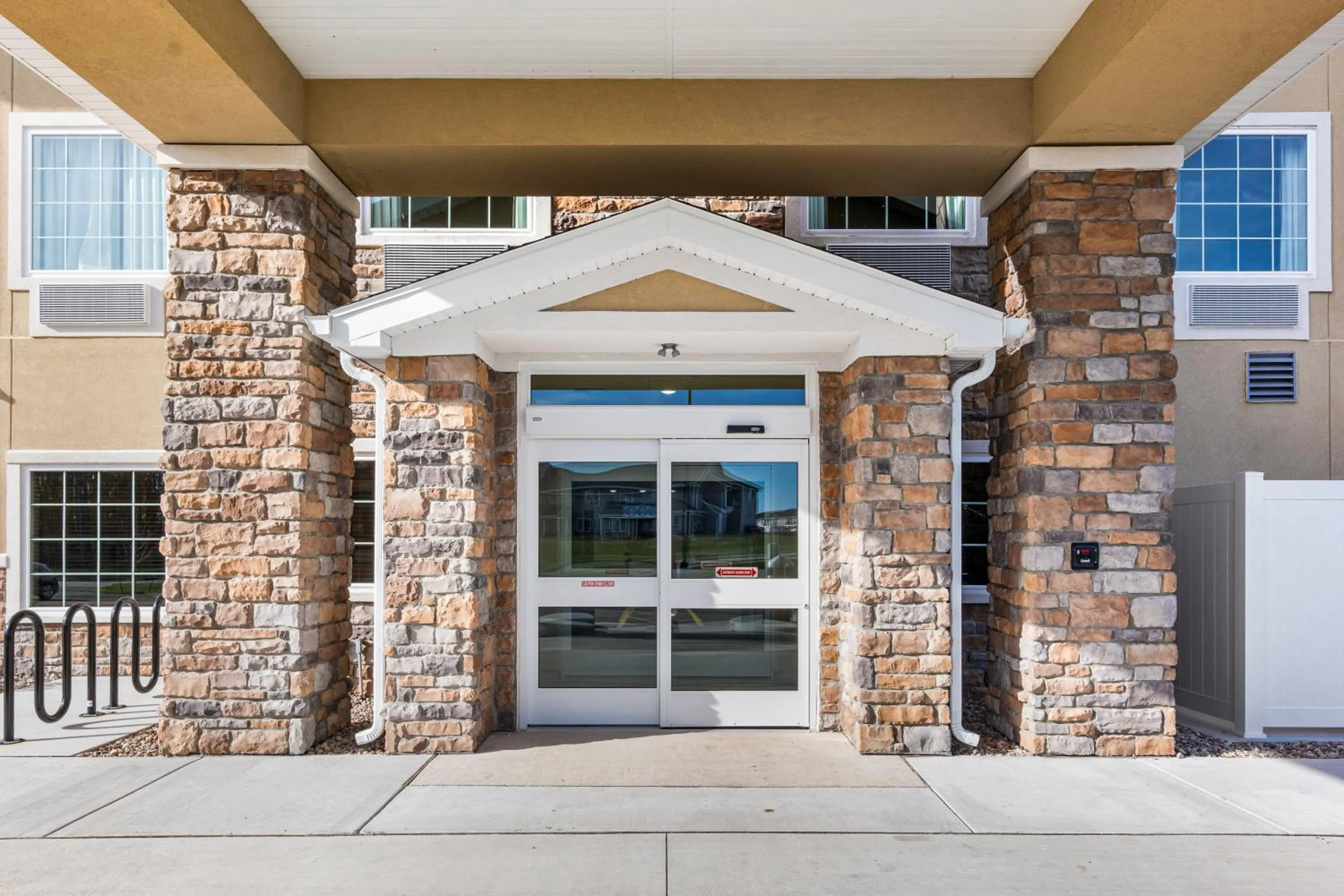 Property building in Cobblestone Hotel & Suites Denmark - Green Bay