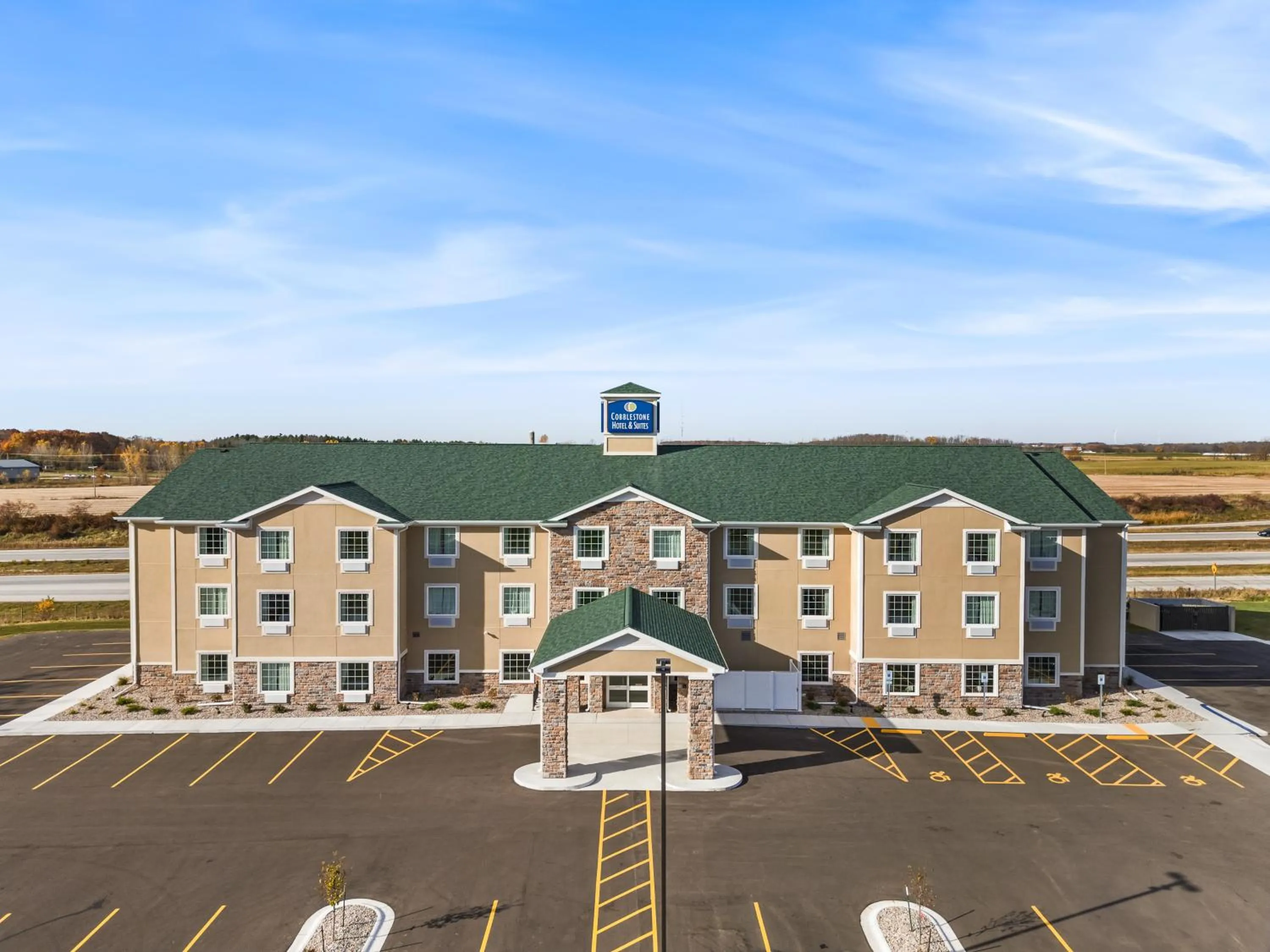 Property building in Cobblestone Hotel & Suites Denmark - Green Bay