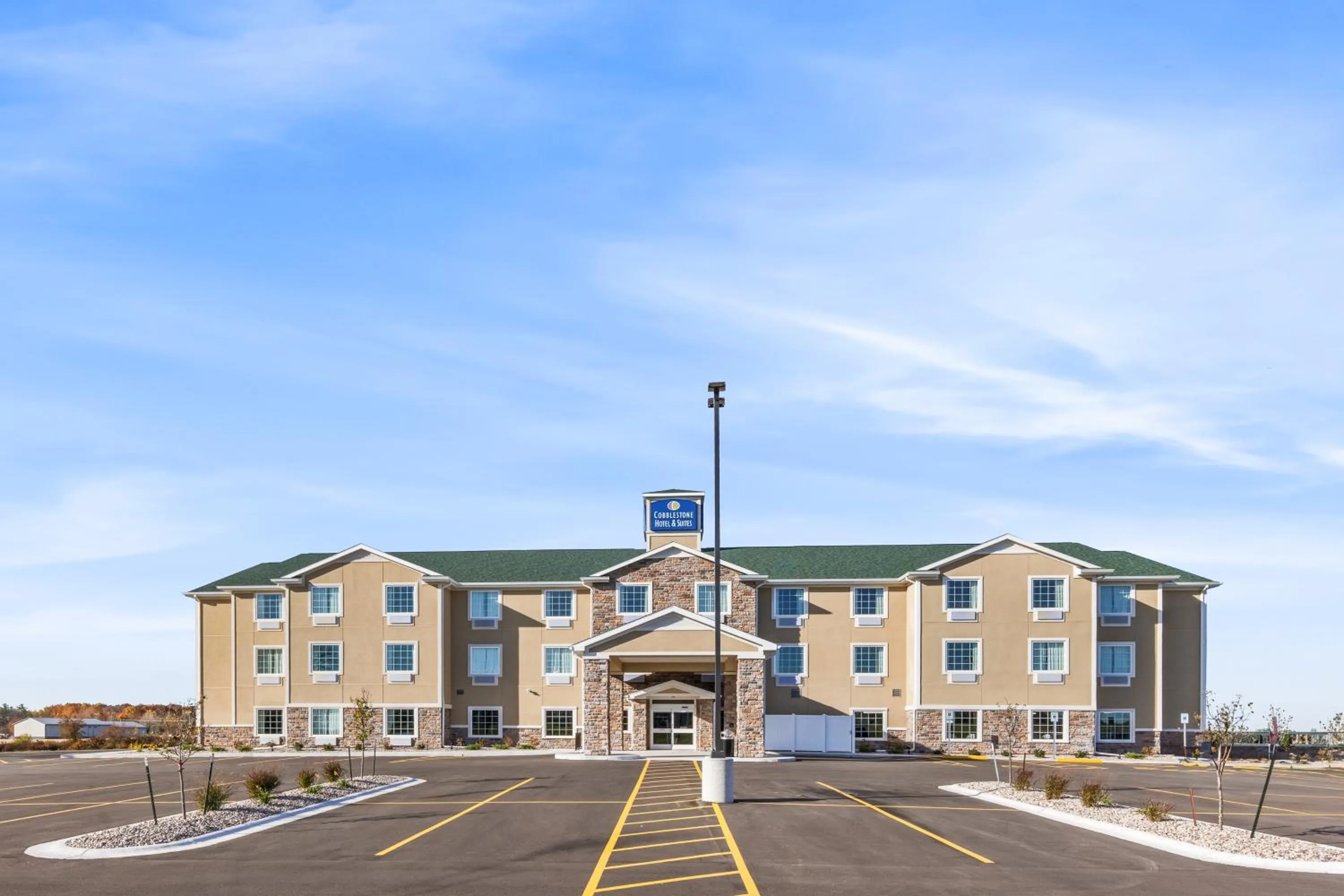 Property building in Cobblestone Hotel & Suites Denmark - Green Bay