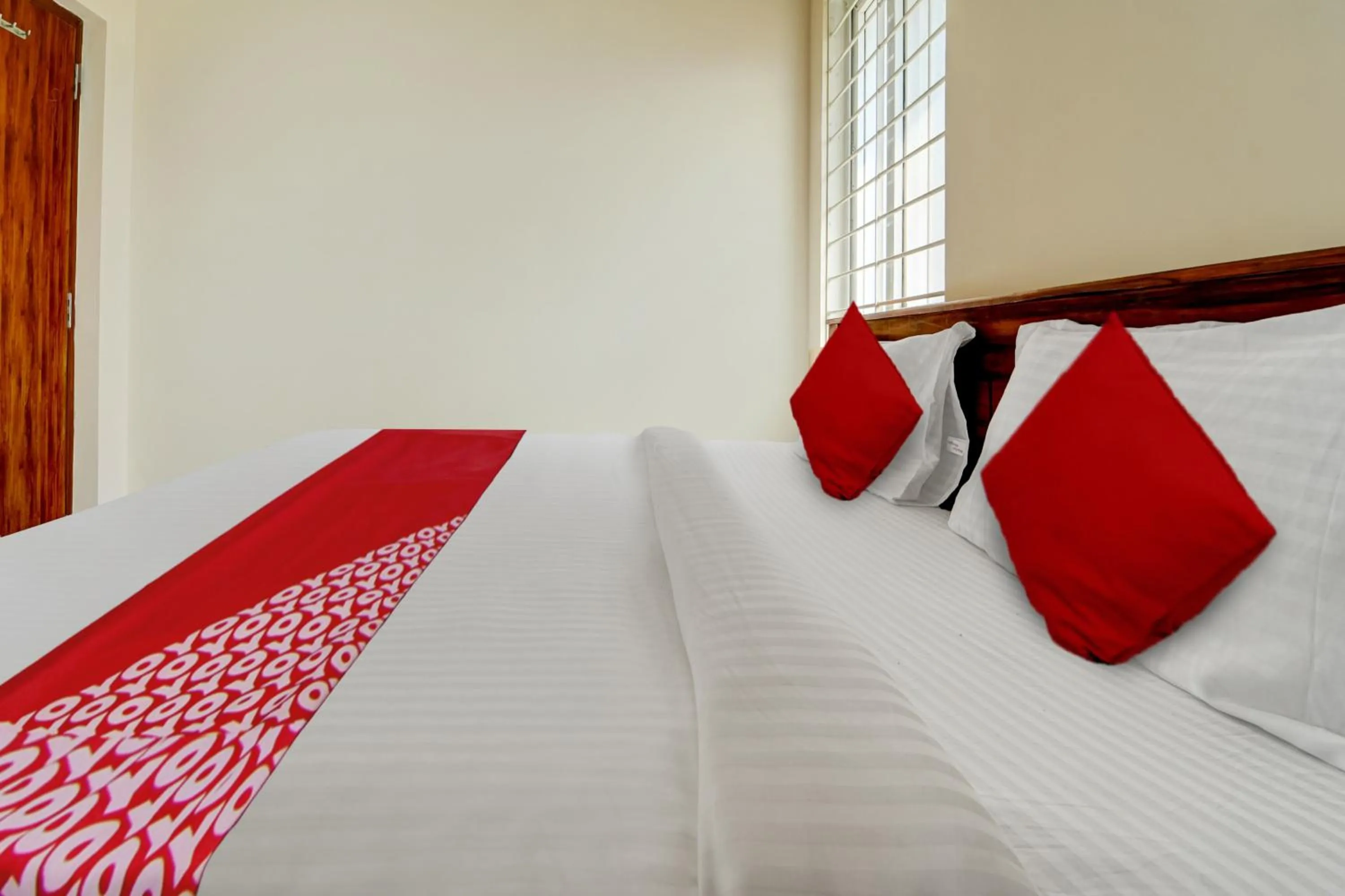 Bedroom in Hotel O MM Home Stays