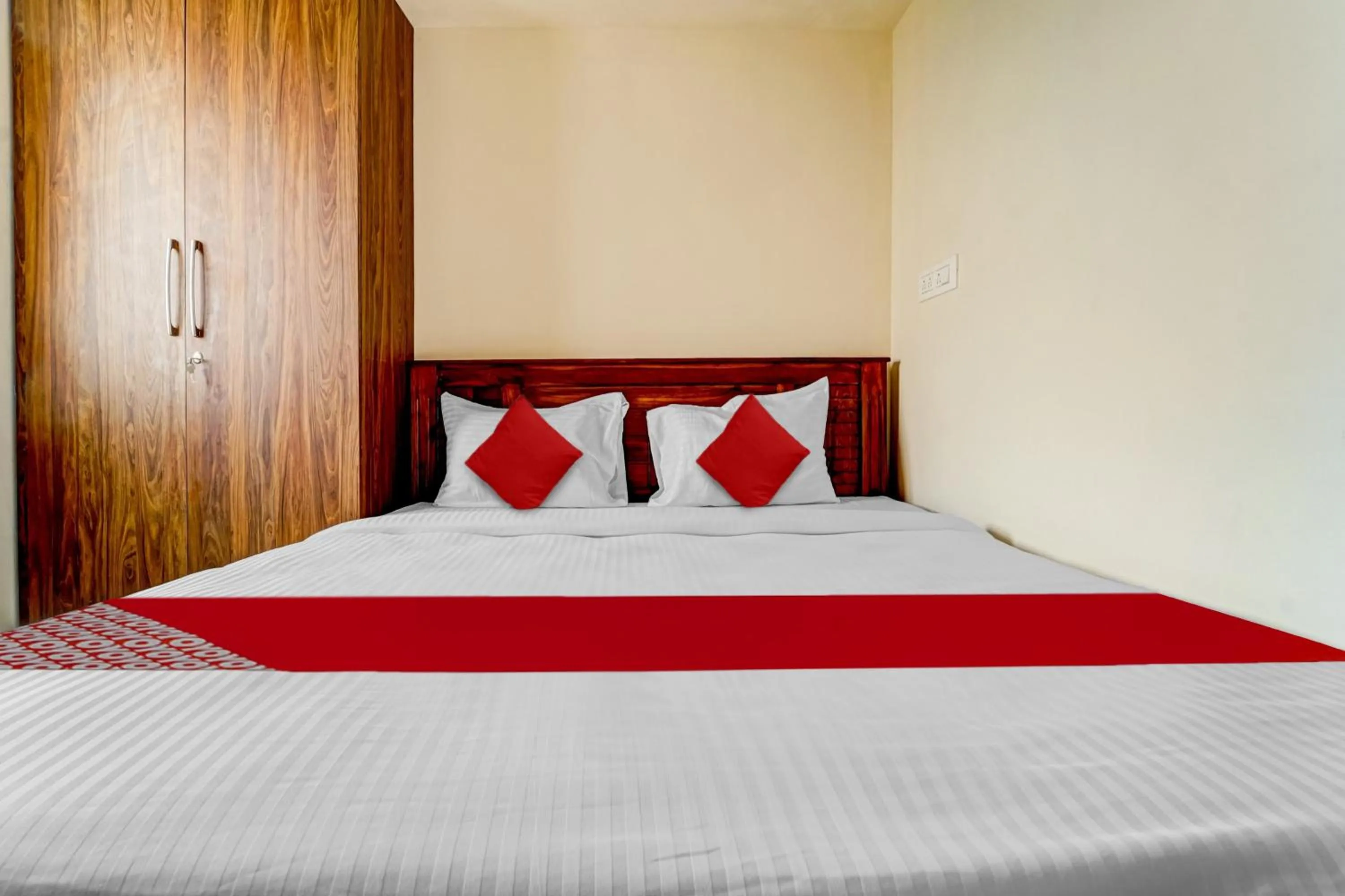 Bedroom in Hotel O MM Home Stays