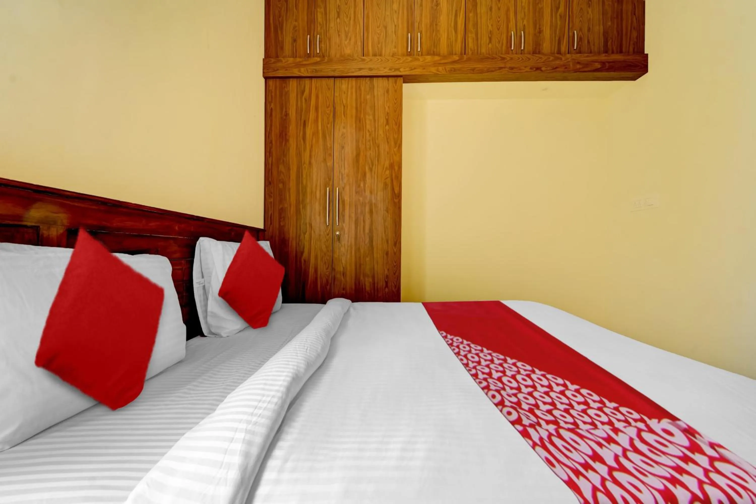 Bedroom in Hotel O MM Home Stays