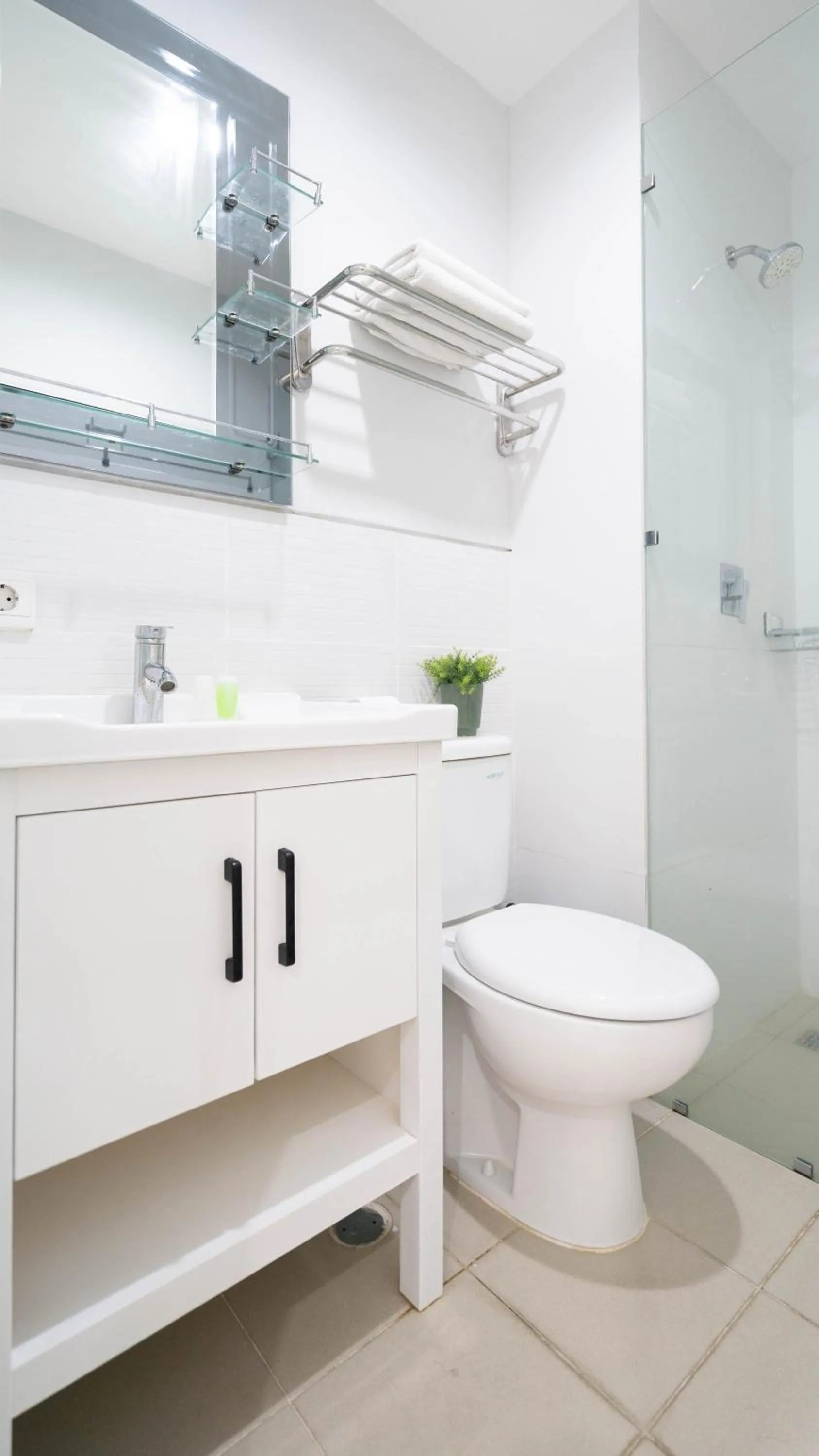 Shower in Cozy Stay Bali by ARM Hospitality