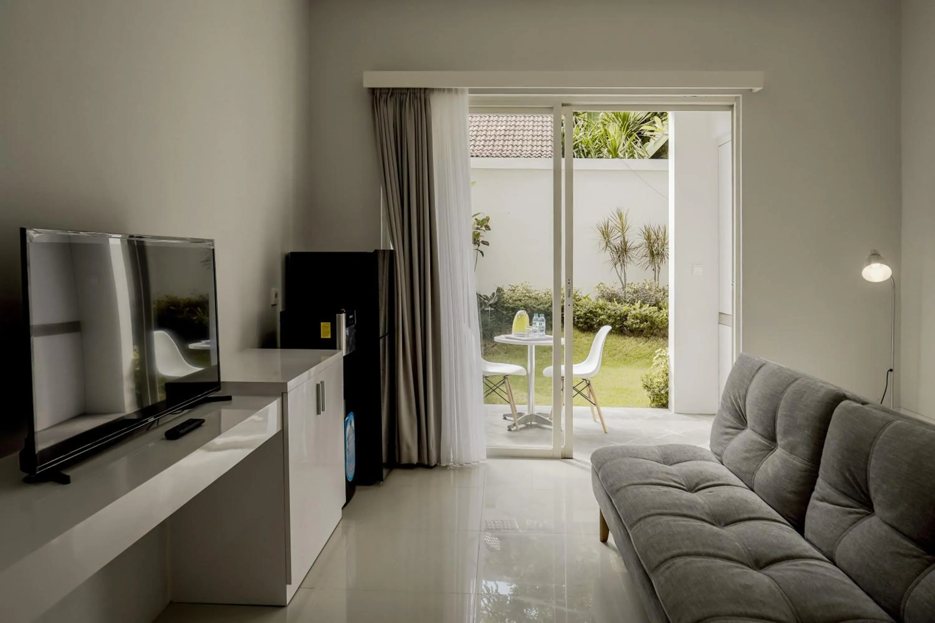 Living room in Cozy Stay Bali by ARM Hospitality