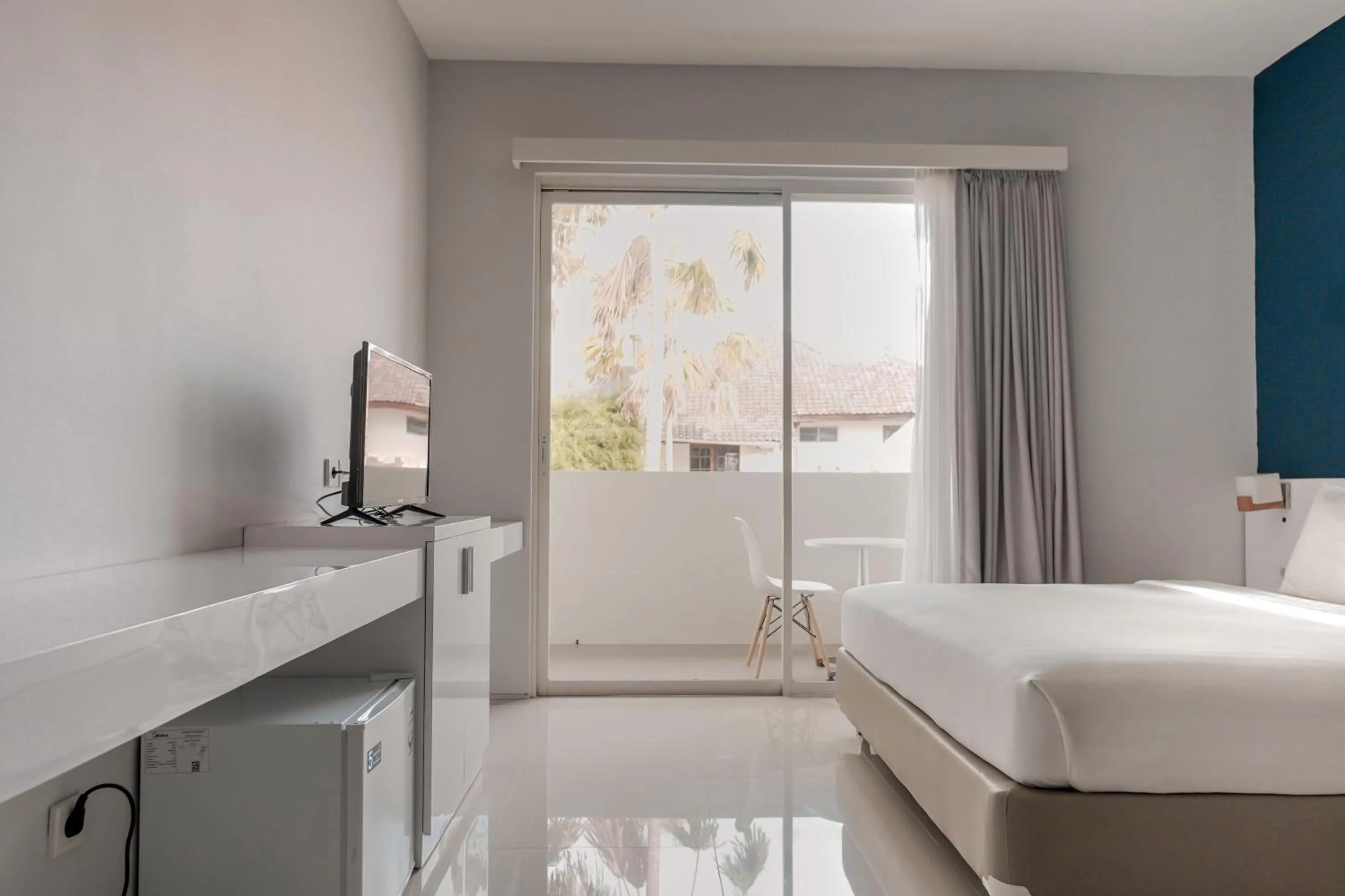 Bed in Cozy Stay Bali by ARM Hospitality