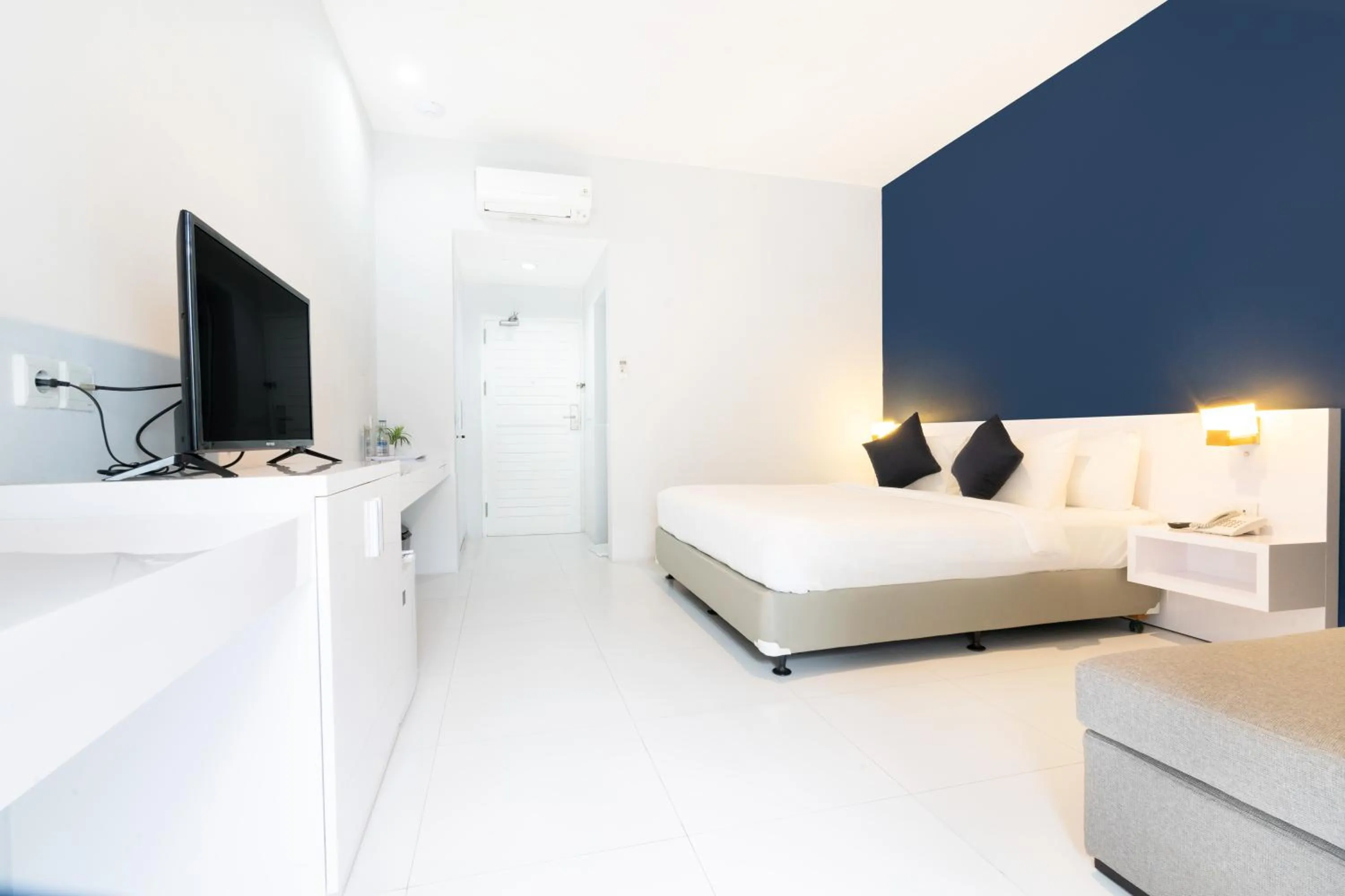 Communal lounge/ TV room, Bed in Cozy Stay Bali by ARM Hospitality