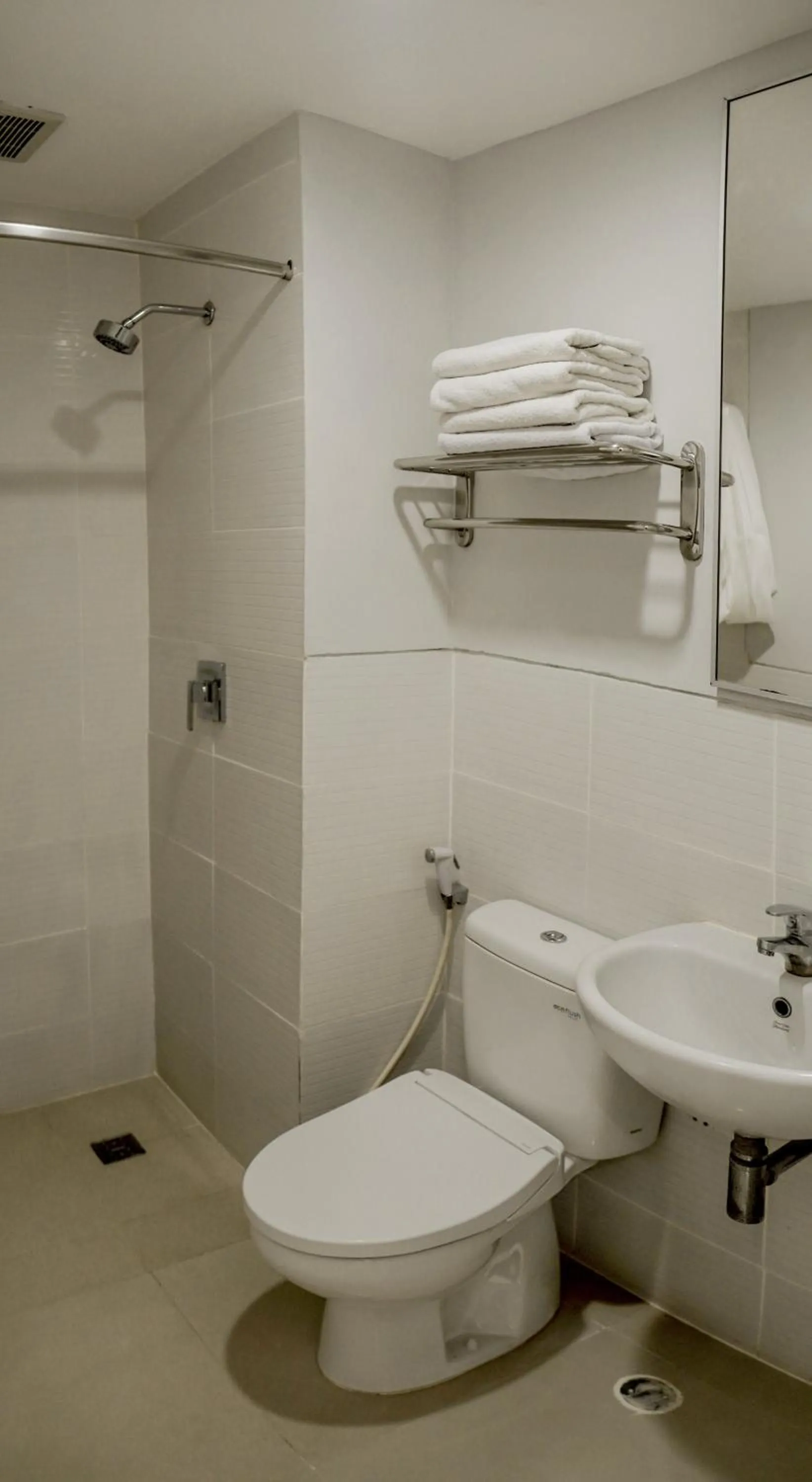 Toilet in Cozy Stay Bali by ARM Hospitality