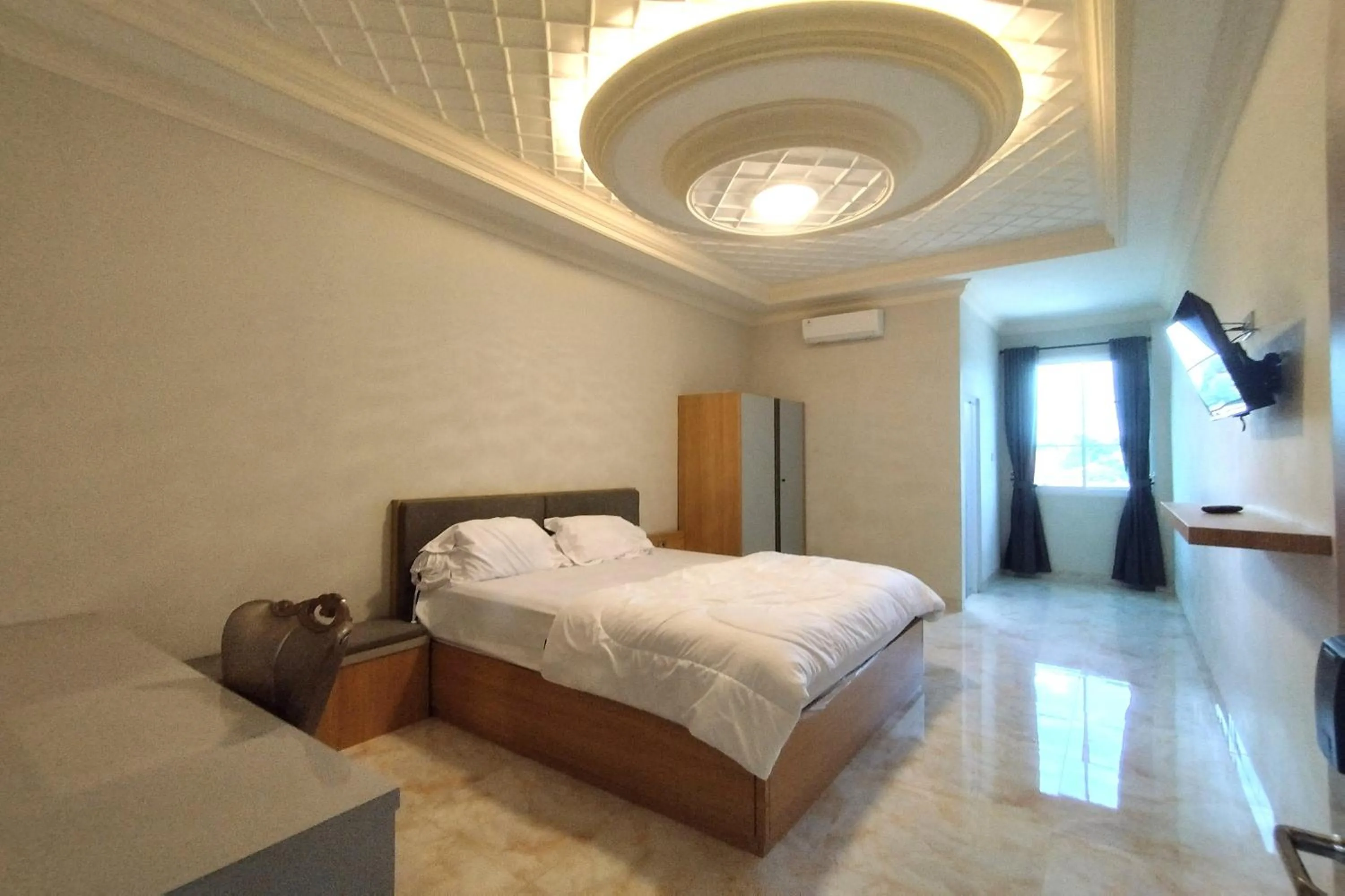Bedroom, Bed in Maulidia Hotel Syariah & Convention Center