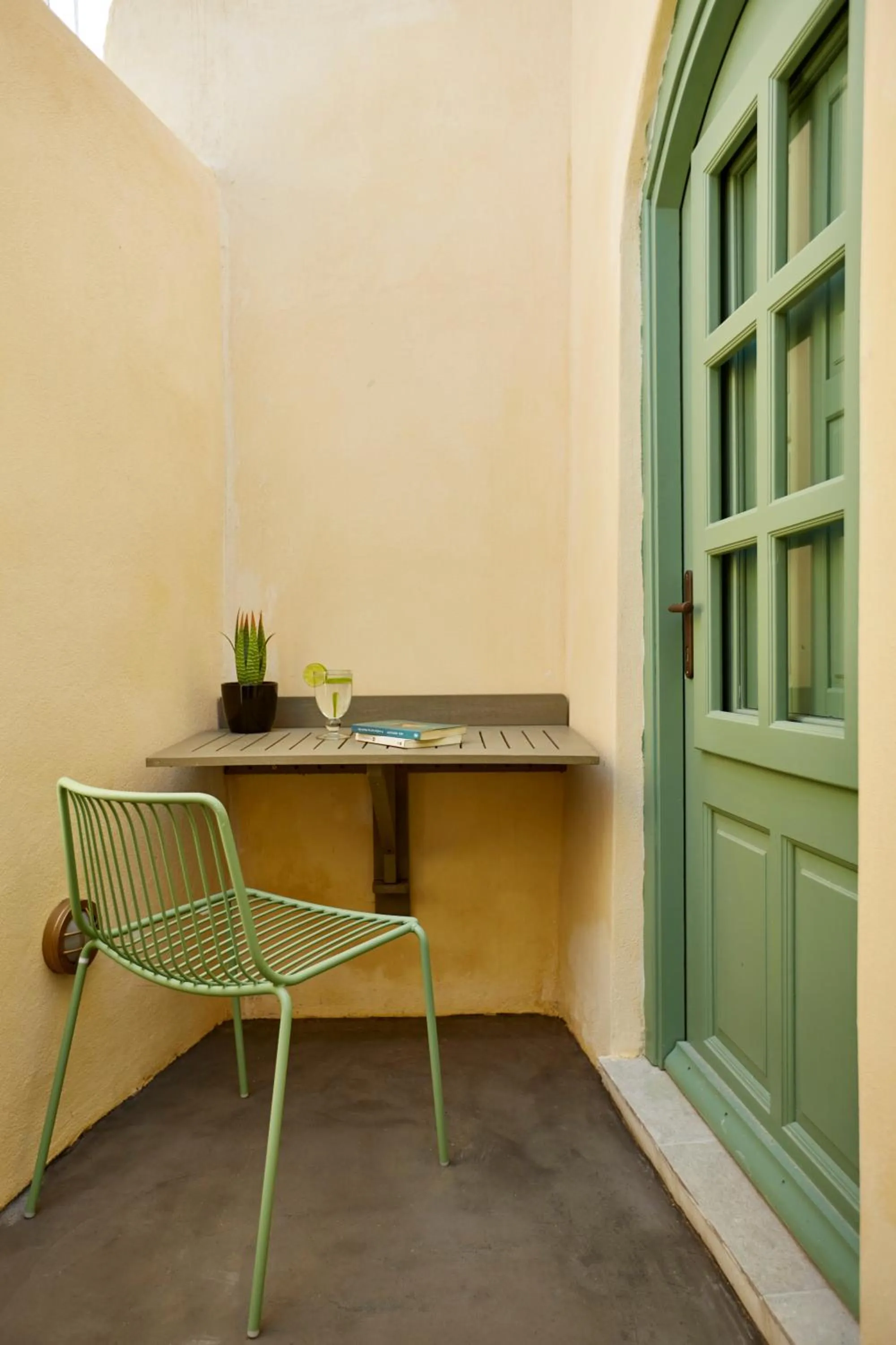 Facade/entrance in Yellow Orchid Cycladic House