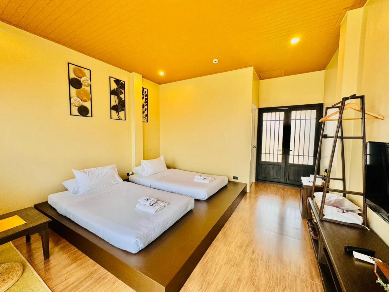 Bed in COZY SHIROI RESORT