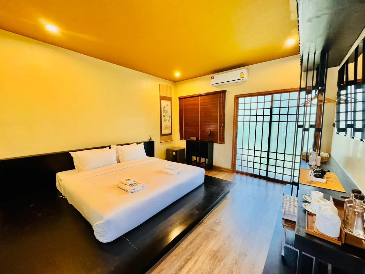 Bed in COZY SHIROI RESORT