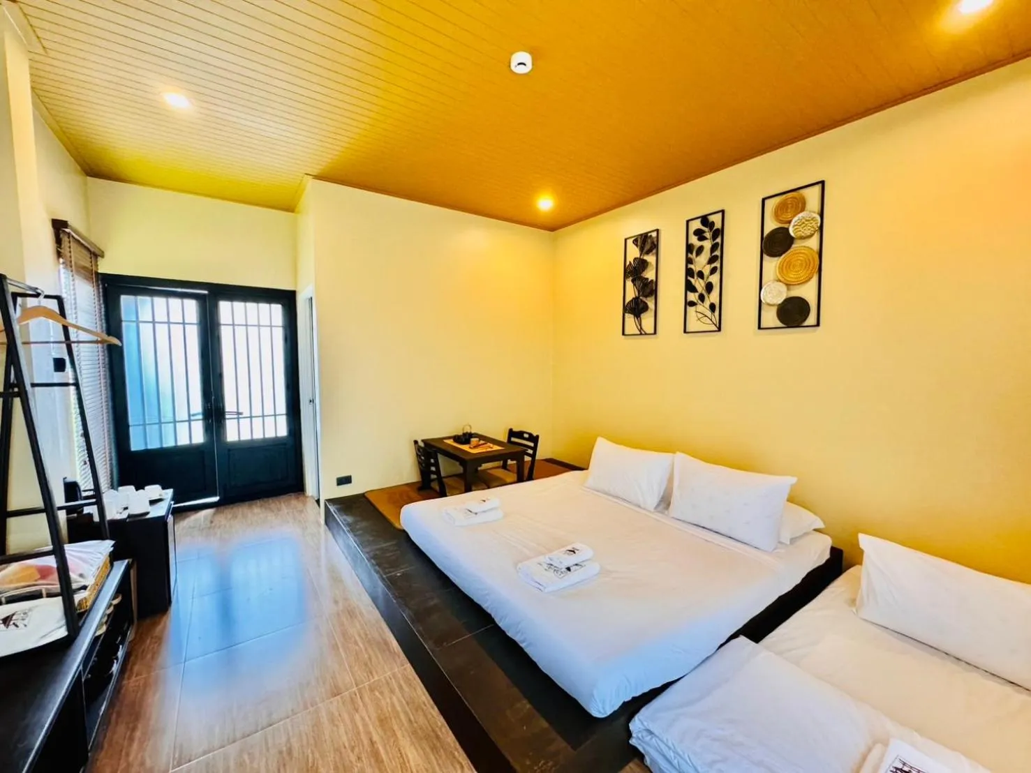 Bed in COZY SHIROI RESORT