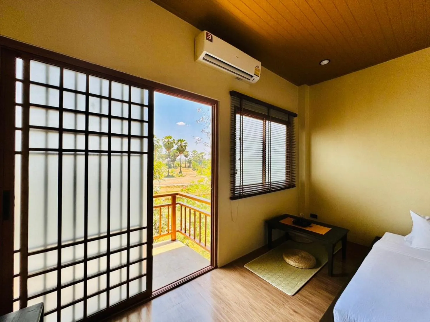 Bed in COZY SHIROI RESORT