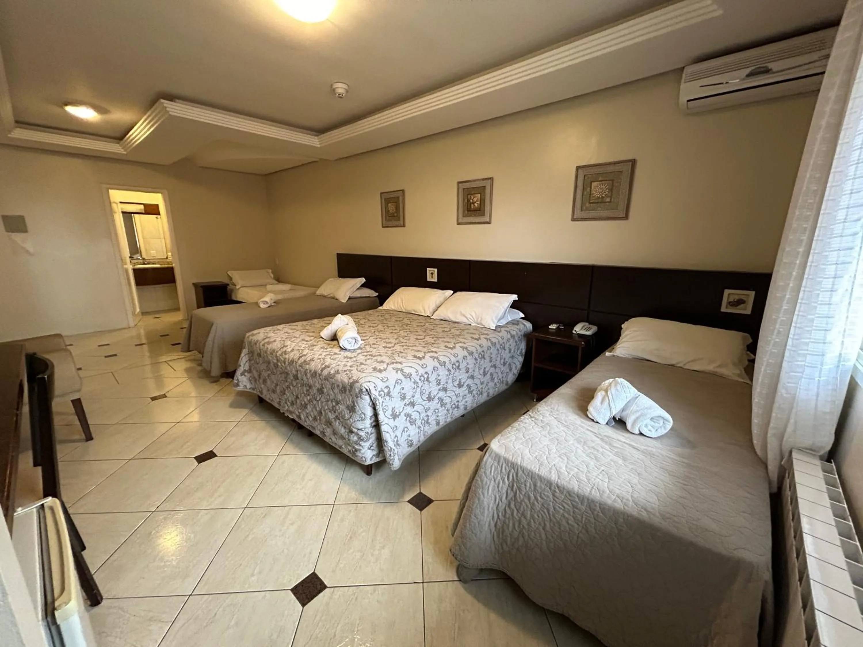 Bed in Pousada Stillo Gramado Via Serena