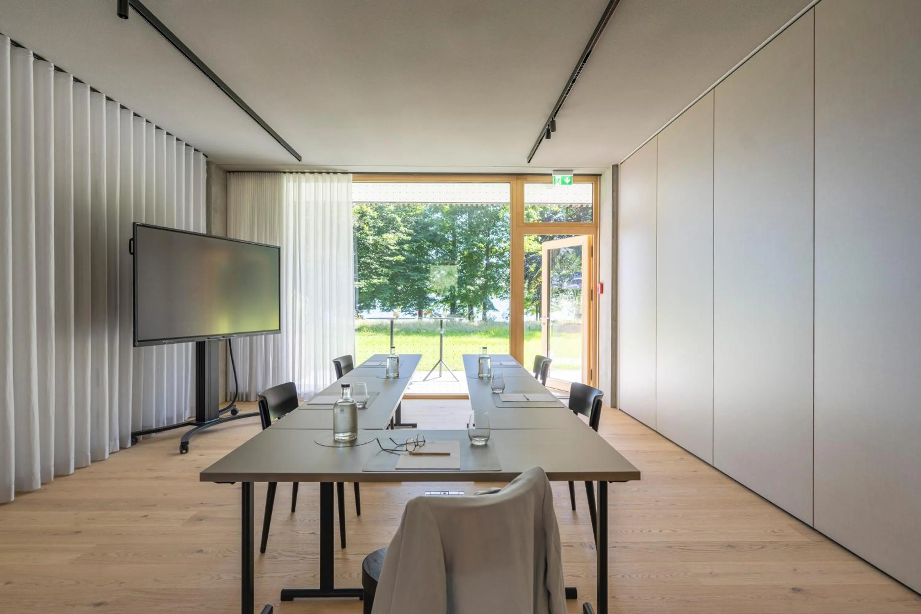 Communal lounge/ TV room in Seegut Zeppelin - a member of Design Hotels