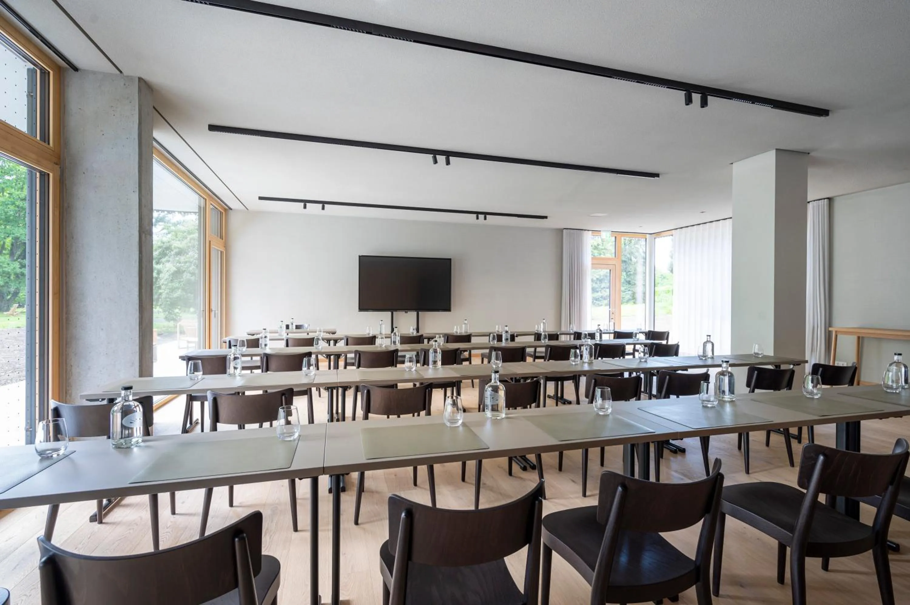 Communal lounge/ TV room in Seegut Zeppelin - a member of Design Hotels